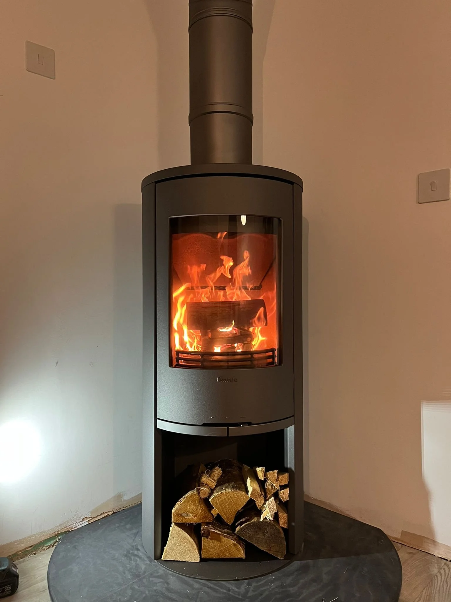 Freestanding Contura corner woodburner