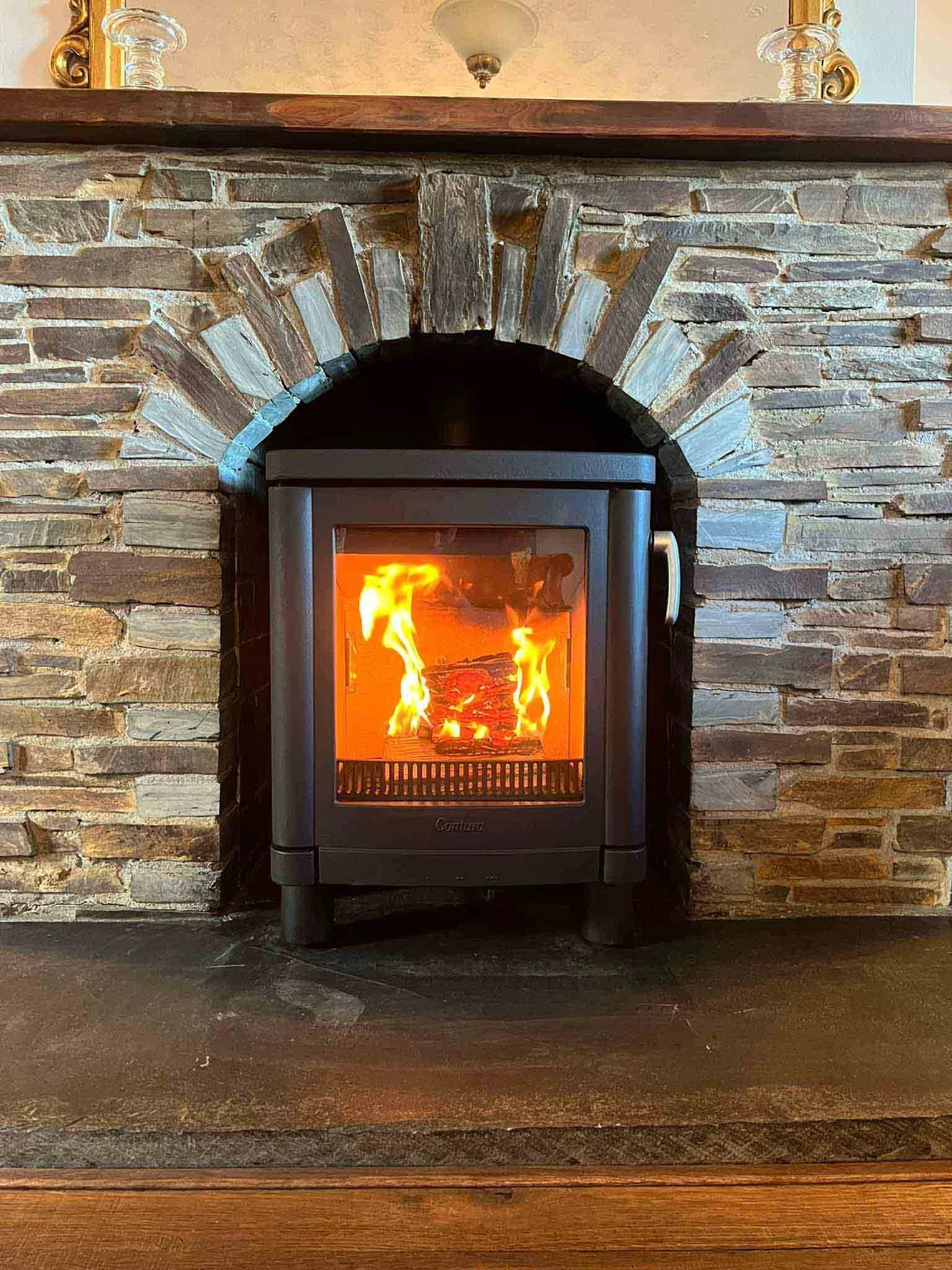 Little Contura woodburner in a traditional Cotnish slate fireplace