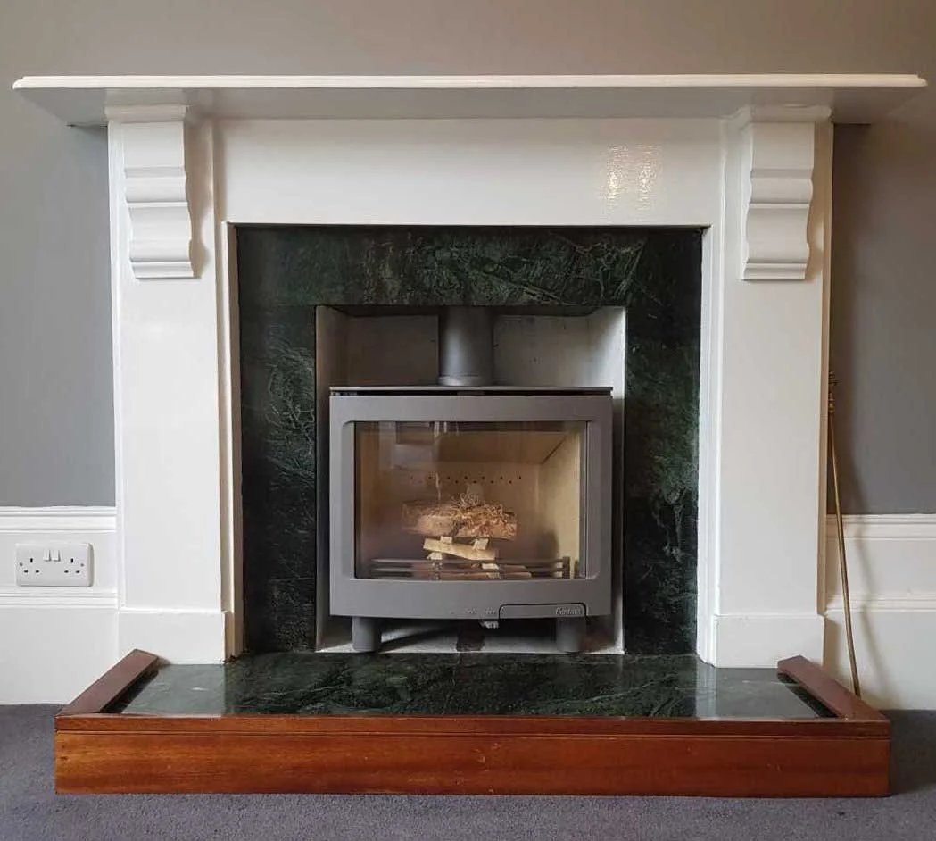 Contura woodburner in a traditional fireplace 