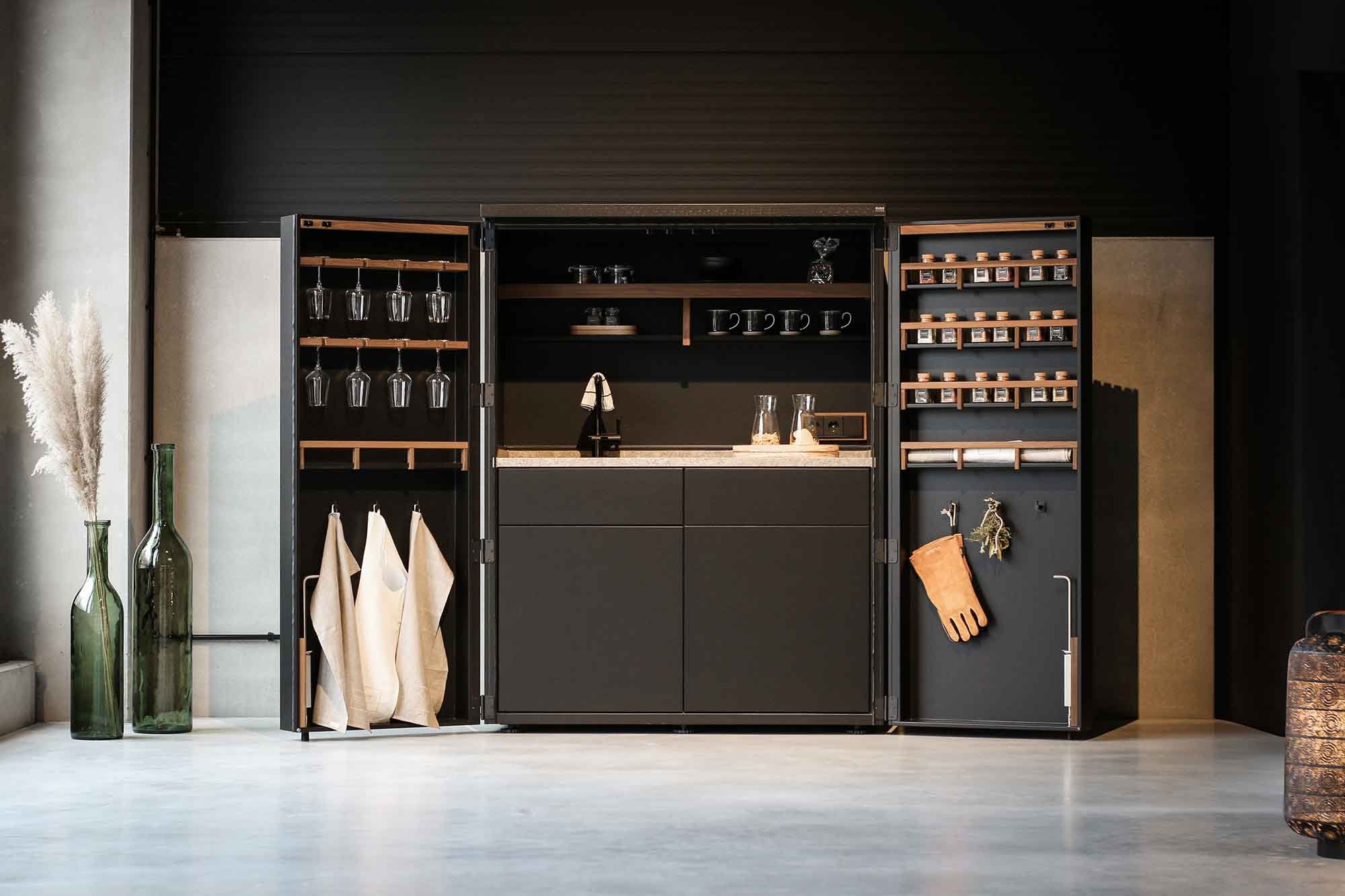 Outdoor kitchen in a cupboard from Cubic