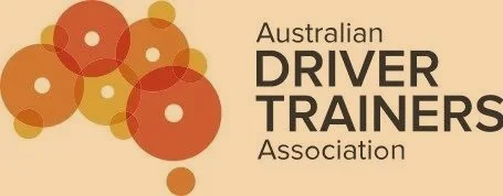 Logo of the Australian Driver Trainers Association with overlapping circles in shades of orange and brown.