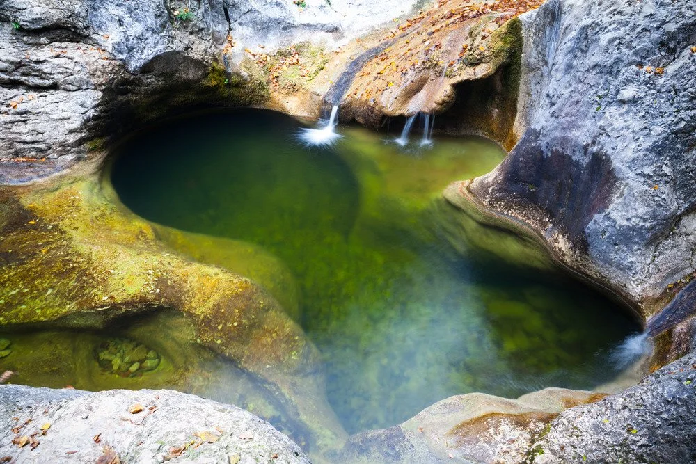Pure mountain lake water fed by melting snow, featured by KoKo To Vision Coaching as part of holistic health and lifestyle guidance.