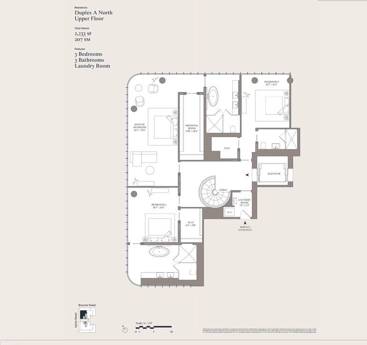 Floor plan of a residence with three bedrooms, three bathrooms, a laundry room, and a walk-in closet, featuring a spiral staircase at the center.