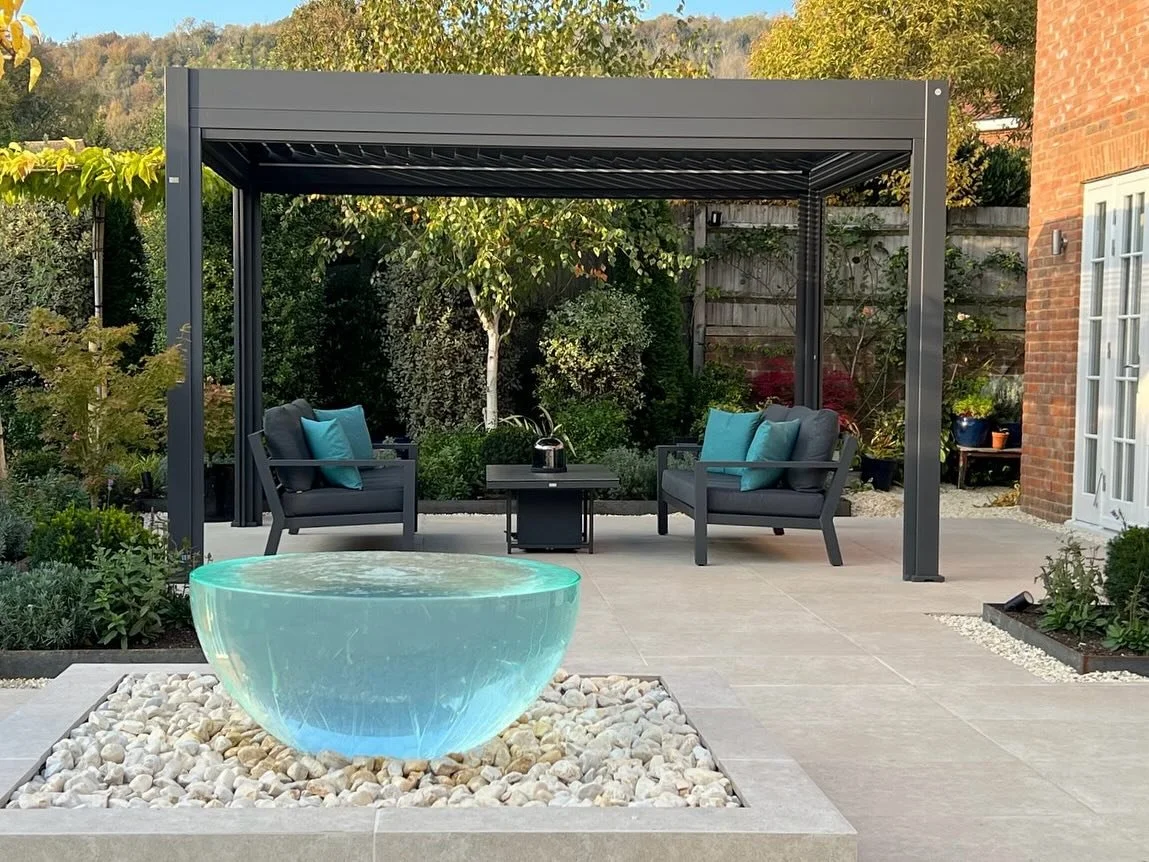 Just completed our beautiful design for a rear terrace and entertaining area includes a stunning Foras water feature, some lovely limestone setts and porcelain tiles from Corker Outdoor Living and parasol trees from Crown Topiary, a pergola from Suns