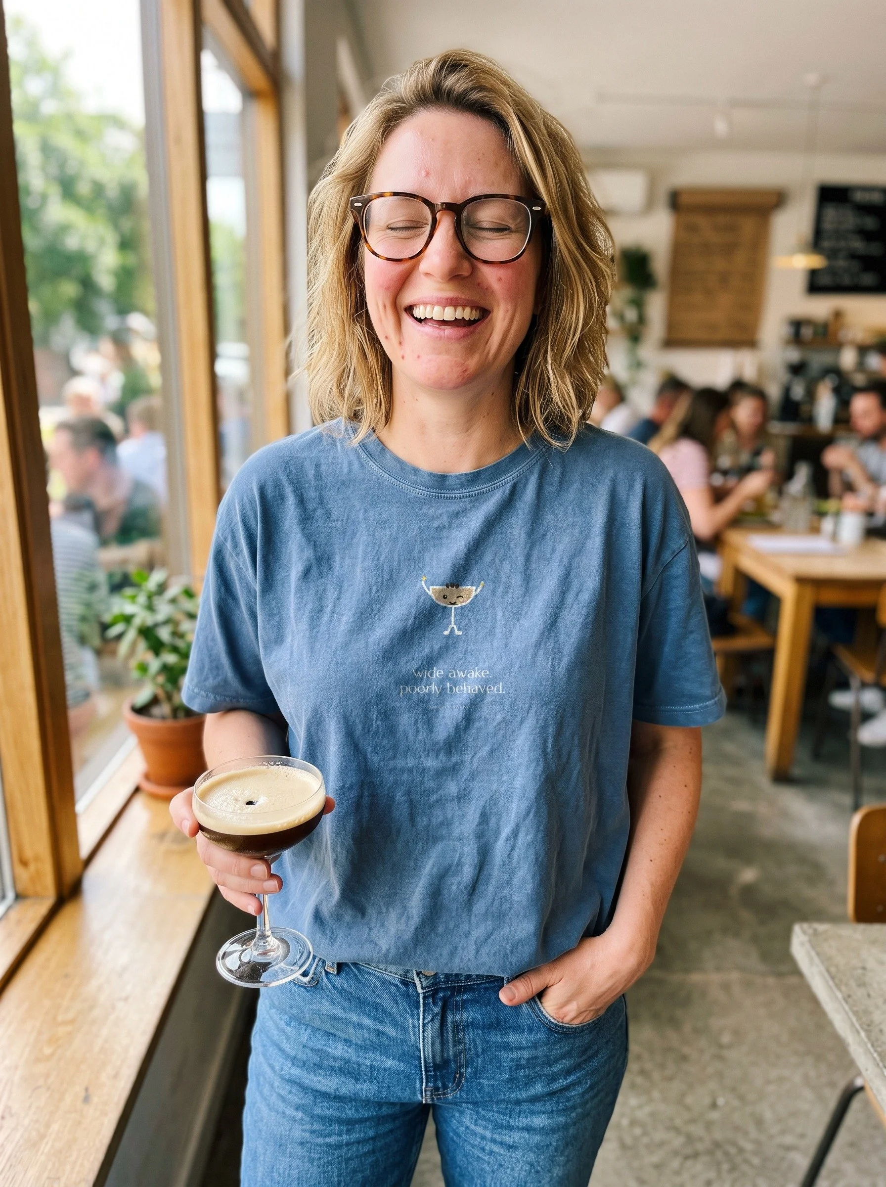 Woman at brunch in a Blue Jean Night Shift tee