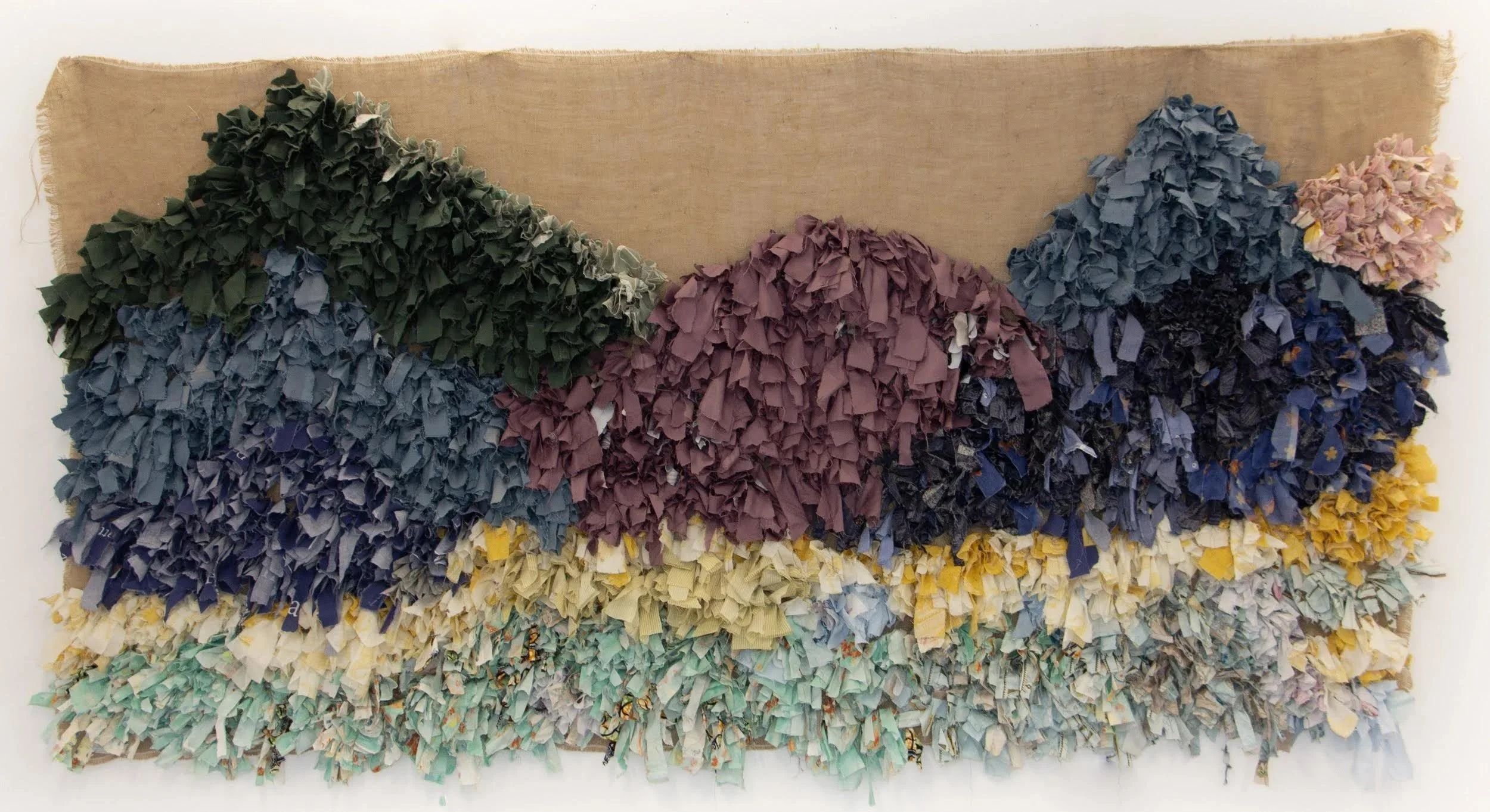 Dominique Bailey-Boahene  
Hills, 2026  
reclaimed textiles  
300 x 200 cm  