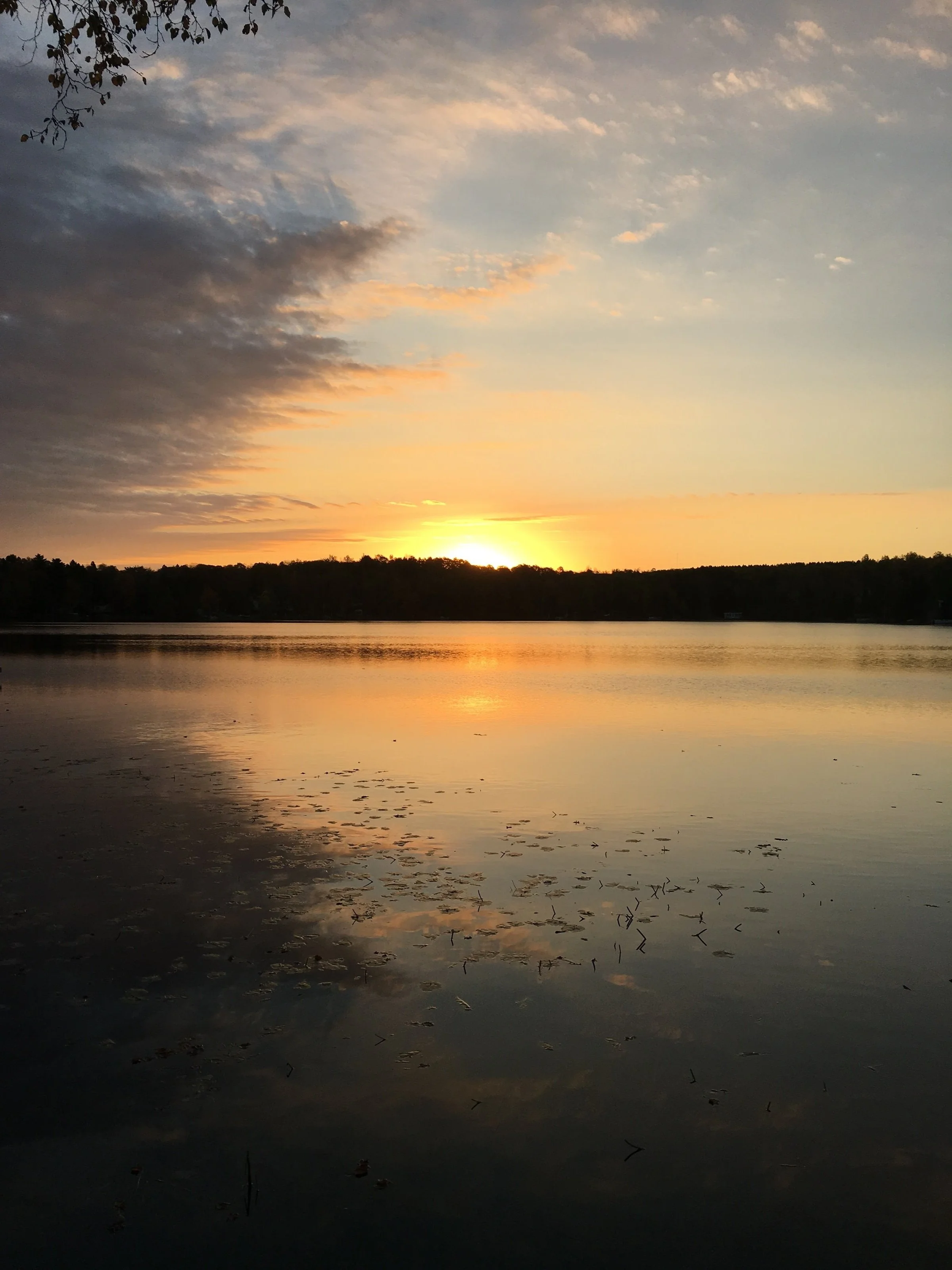 Sunrise over the lake at the cottage.jpg
