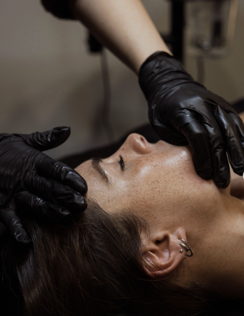 Buccal facial massage treatment in Boise focused on facial sculpting, jaw tension relief, and lymphatic drainage.