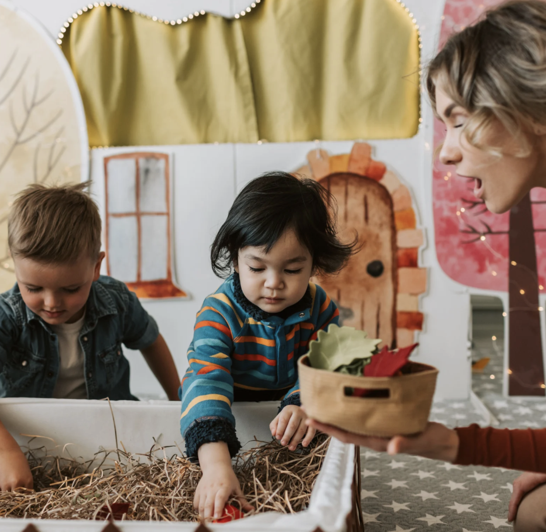 Parent helping toddler develop speech and language skills through interaction in Fayetteville NC