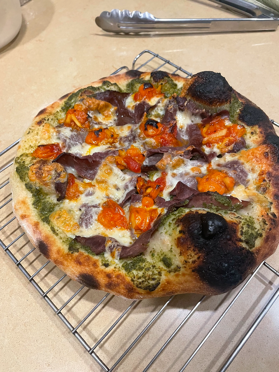 Pizza - garden cherry tomato and pesto.