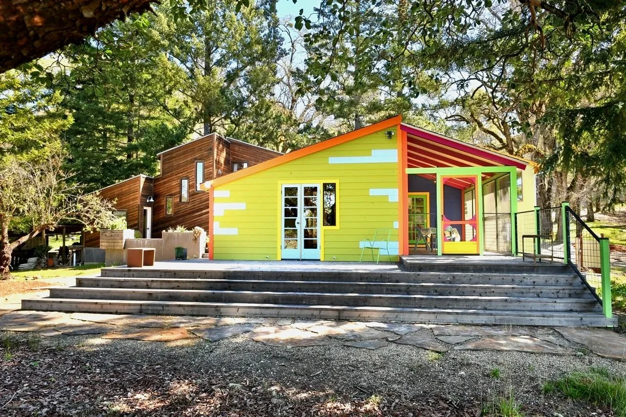 From the back, dining room and porch...