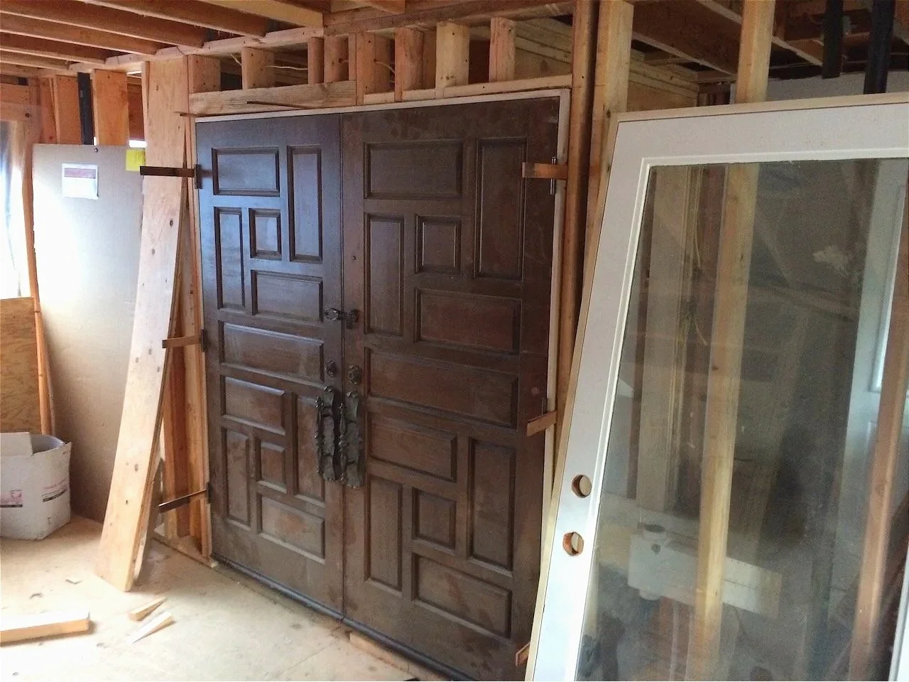 Vestibule, between the "public" side and the "private" side - installing these amazing doors...