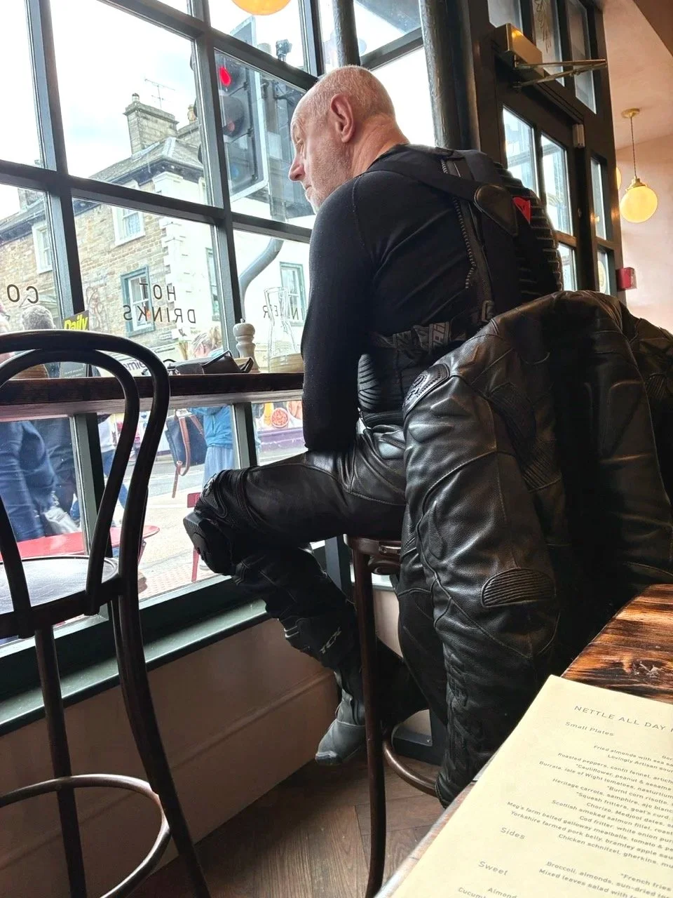 ...other rough and tumble patrons, like this full-gear biker