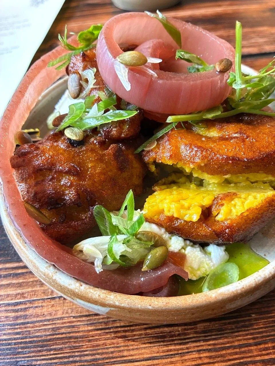 ...squash fritter, goat's curd and pickled red onion. Delicate, hearty, sweet earthy squash contrasting with the mild sharpness of the onion