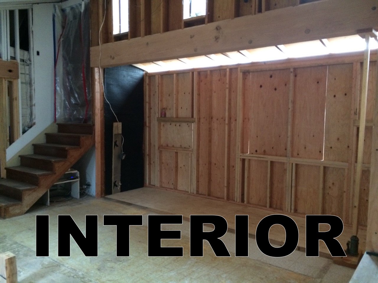 Kitchen, framed. window removed, counter -level windows coming.