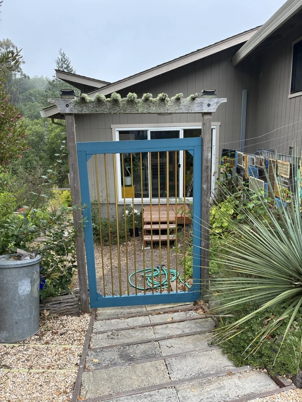 Found: golden extruded aluminum rods, two diameters, purchased with unknown origin or destination...became two gates...