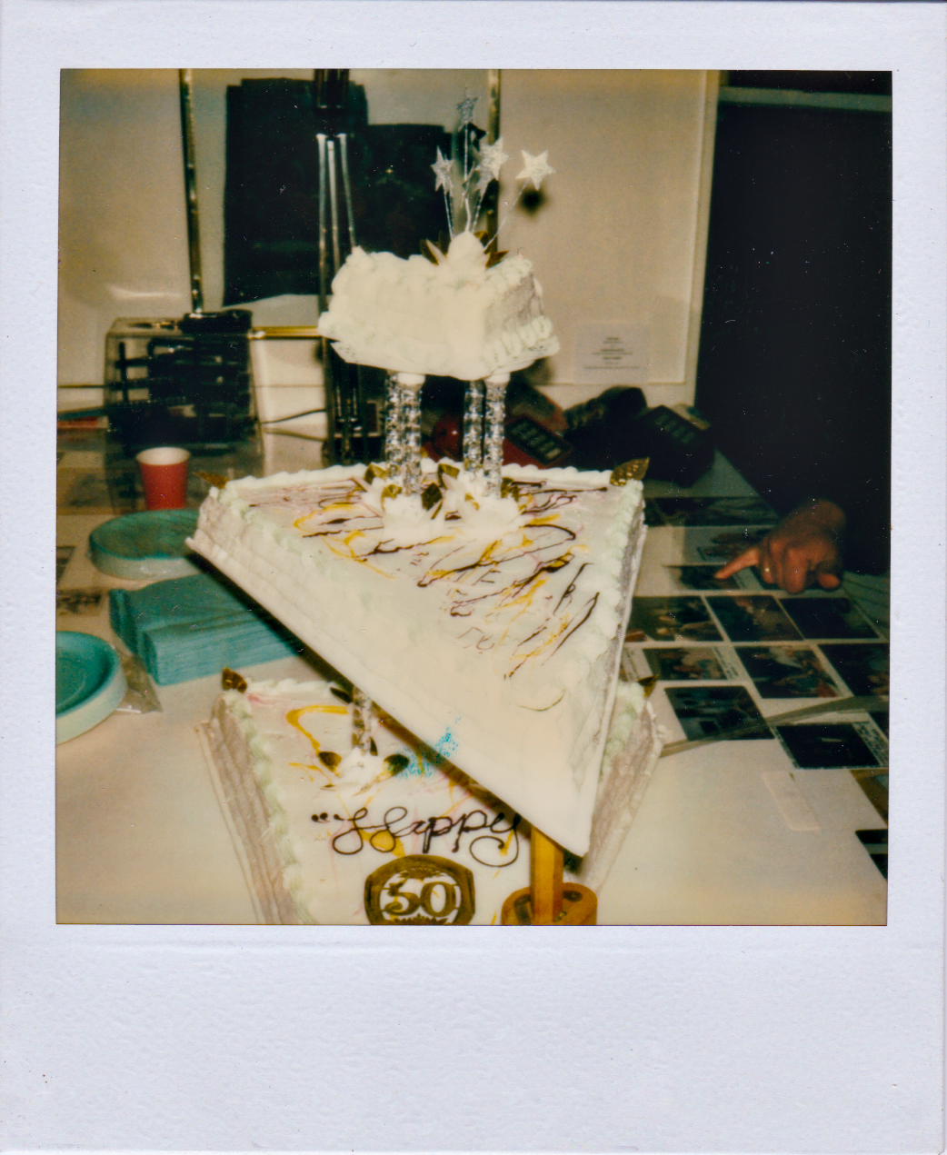 Ron's birthday cake - I asked if it was OK if I went architectural.  I used columns used on wedding cakes, double layers of cardboard. It looks like we later added an extra support, I think it's a wood marking gauge?
