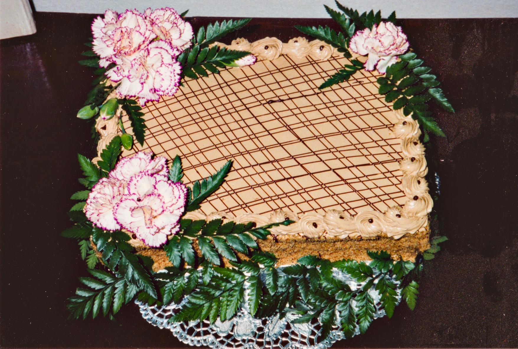 Most likely...a walnut cake with coffee buttercream. Here, we're in Oakland with Mark, late 90s, perhaps.