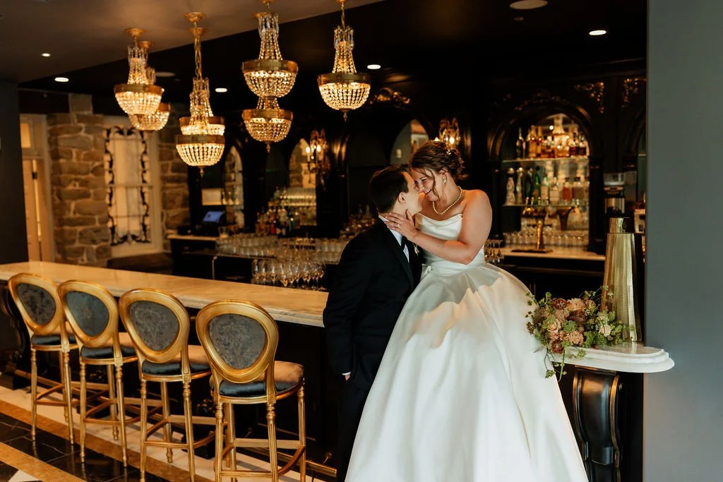 Laurie’s customers, Larissa and Emmett, just married walking off the aisle together.