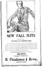 Vintage black and white advertisement for new fall suits tailored by Fleishman's, featuring a man sitting confidently in a suit. Lineage of Thompson's of Wilmington, a Men’s clothing store in Wilmington NC.