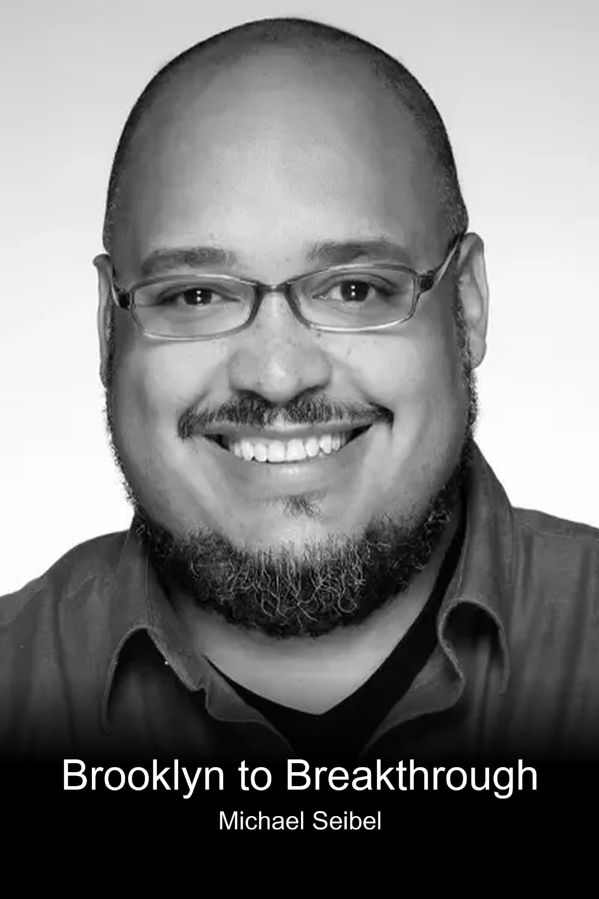 Black and white headshot of a smiling man with glasses, a beard, and mustache, wearing a collared shirt. Text at the bottom reads "Brooklyn to Breakthrough" and "Michael Seibel."