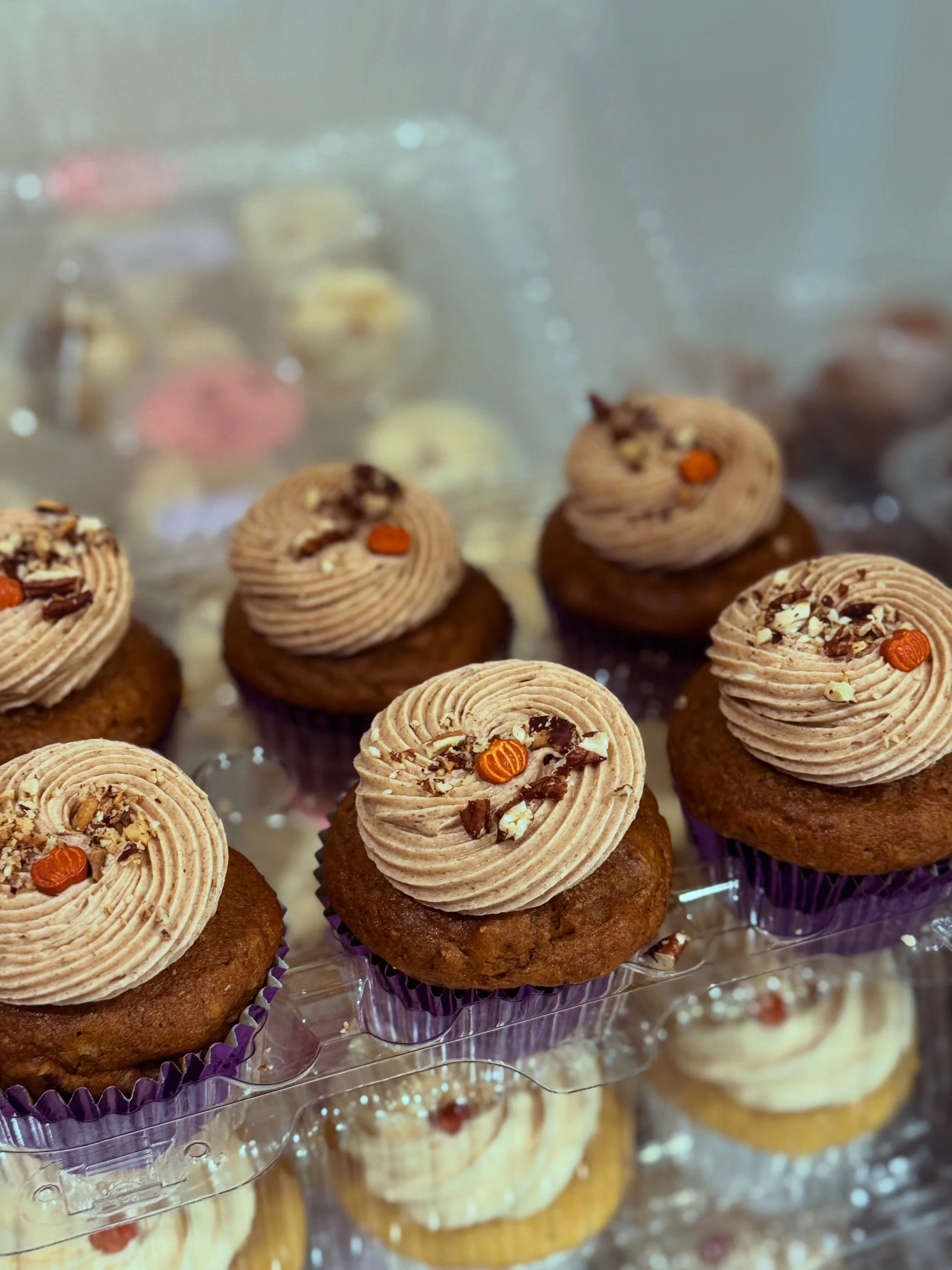 Happy Pumpkin Day from Skycakes! 🎃🧁🧡💜 Celebrate with our Pumpkin Pecan cupcakes topped with cinnamon cream cheese frosting! Visit skycakesxskyzeno.com or text 713-319-4113 to order today! 🎃🧁🧡💜 #PumpkinDay #Cupcakes #HoustonDesserts #Skycakes