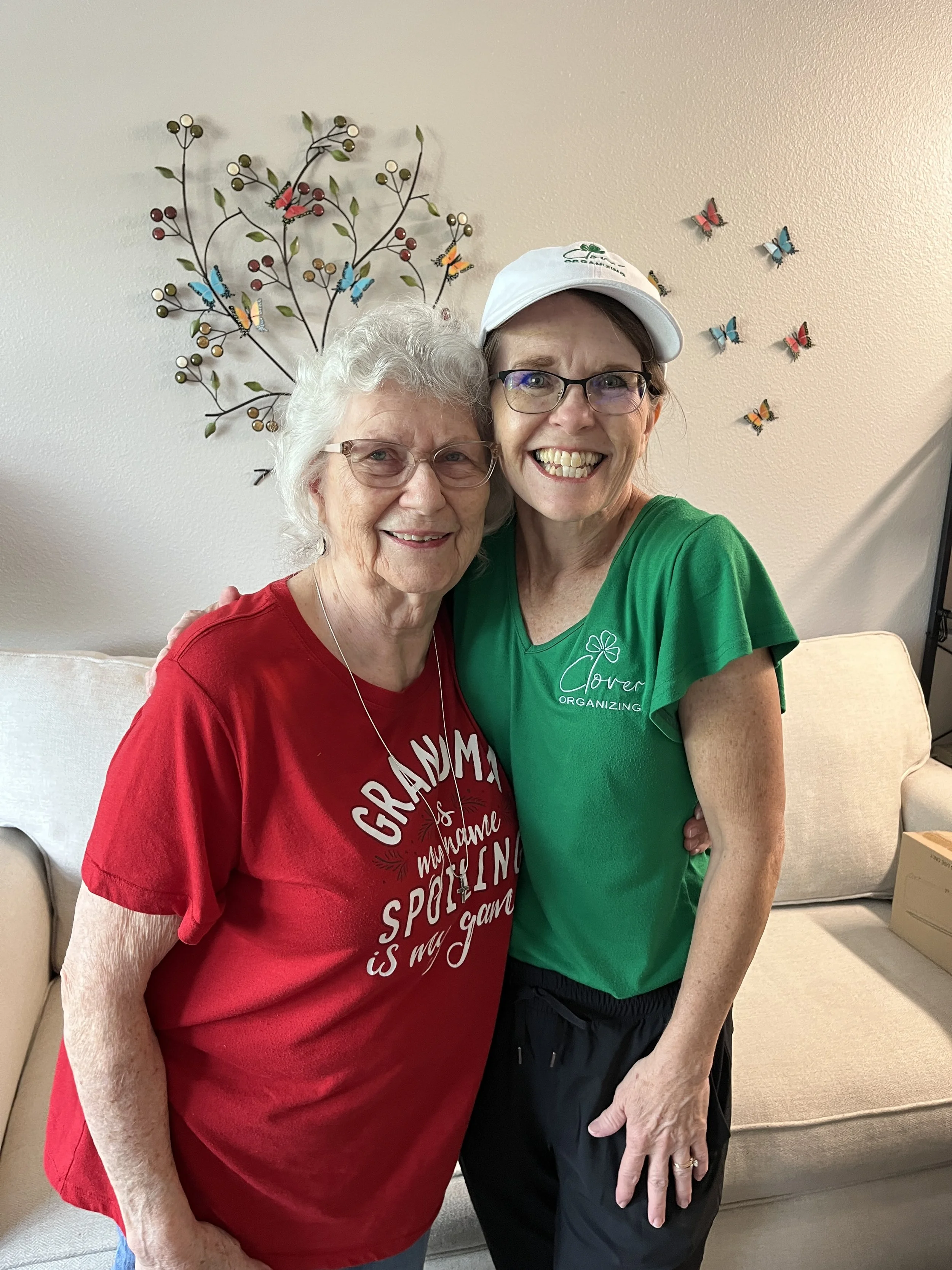 organizer with female senior citizen smiling