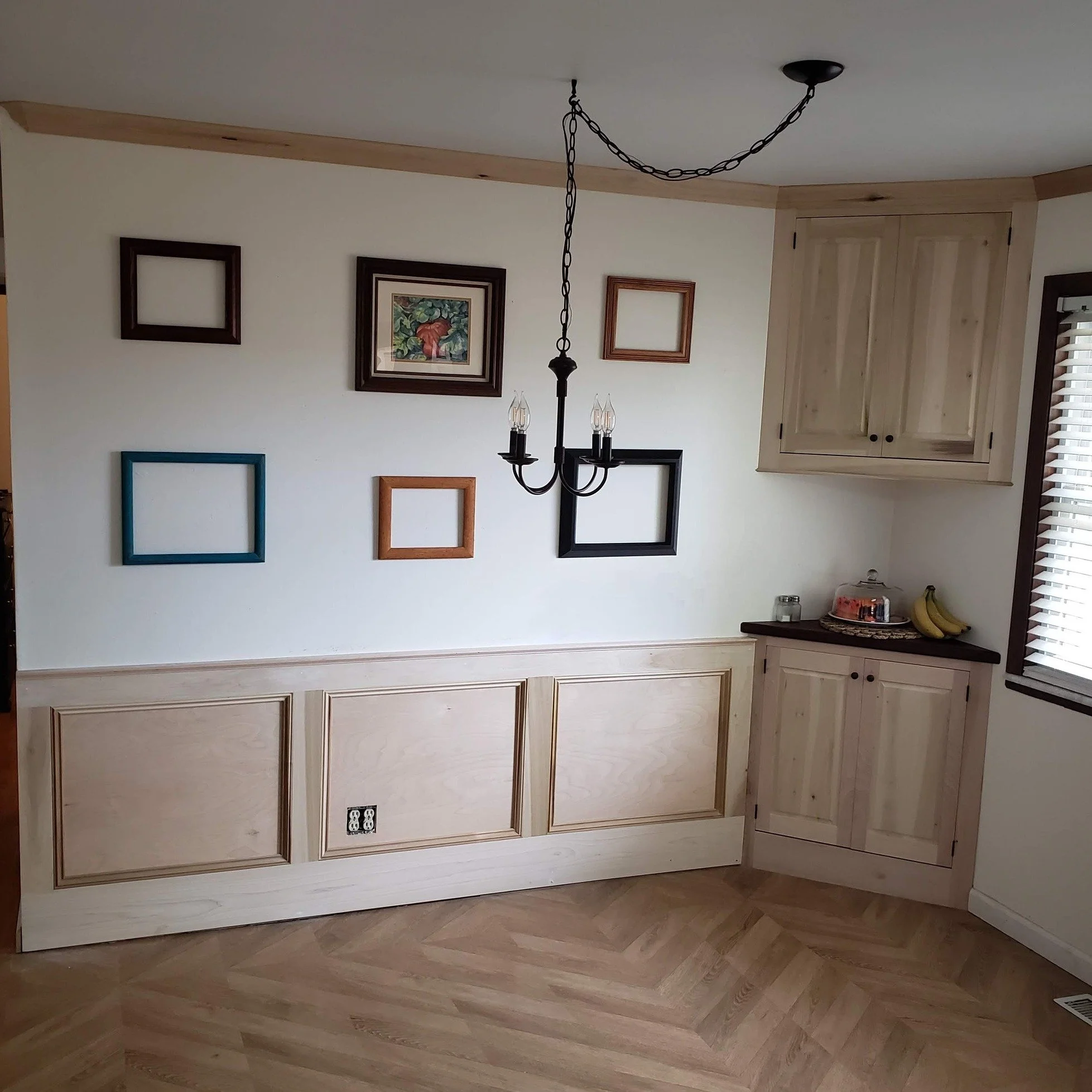 Made some great progress on the dining room, which has been a bit of a blank canvas for years. Built out some corner cabinets, added wainscot, crown molding, and some soon-to-be-filled frames. I adjusted a few things from my original sketch over a ye