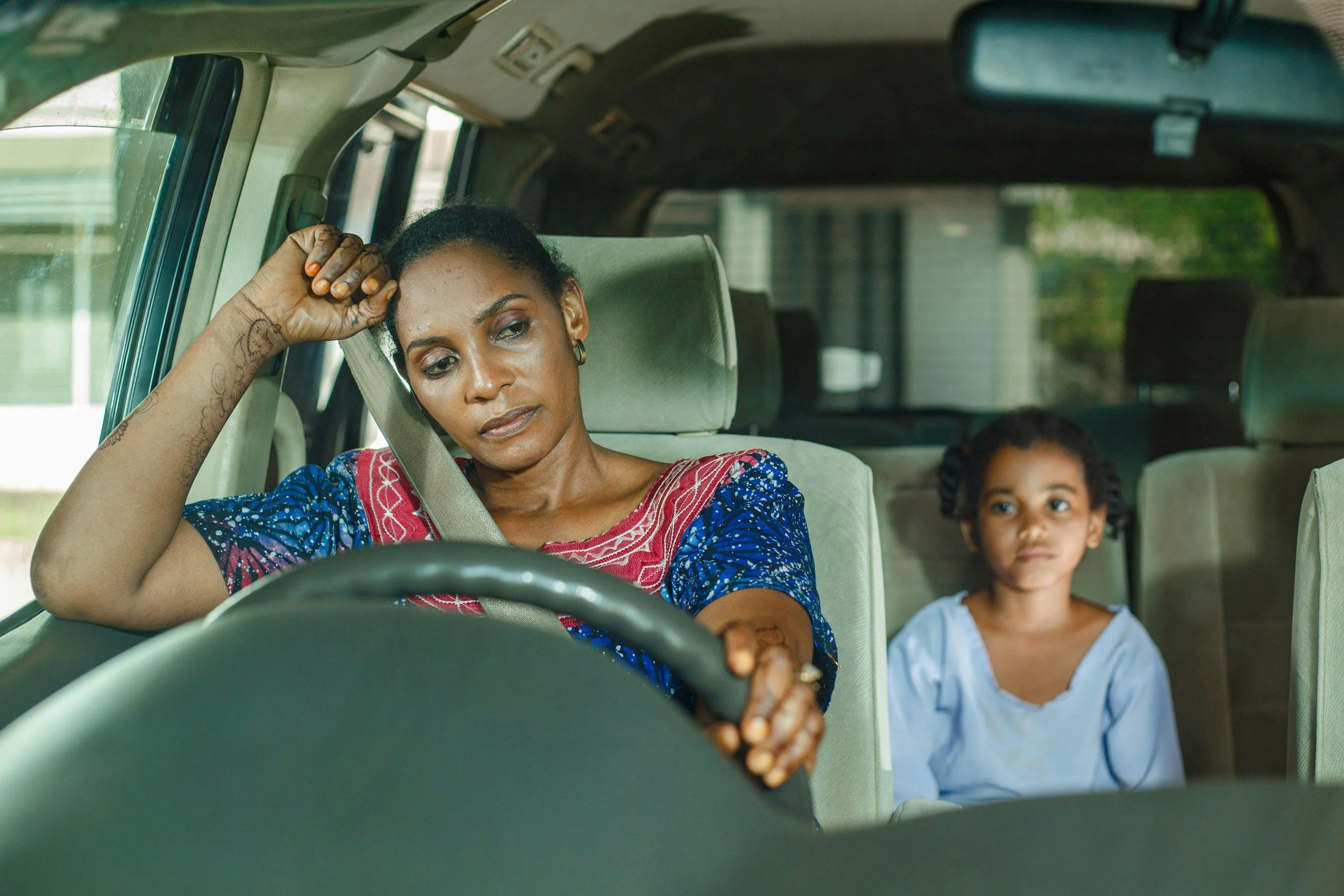 A parent feeling stressed and triggered from childhood trauma