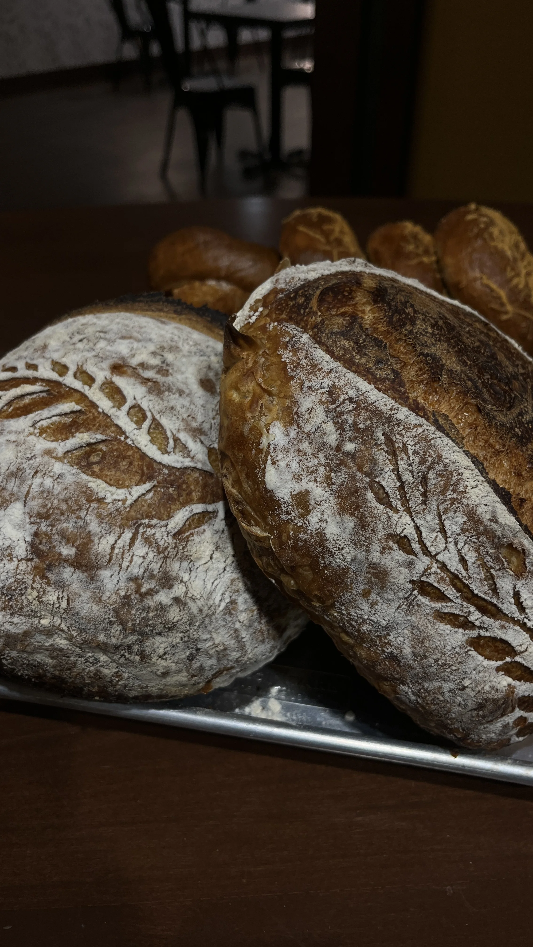 Fresh sourdough loaves baked in-house!