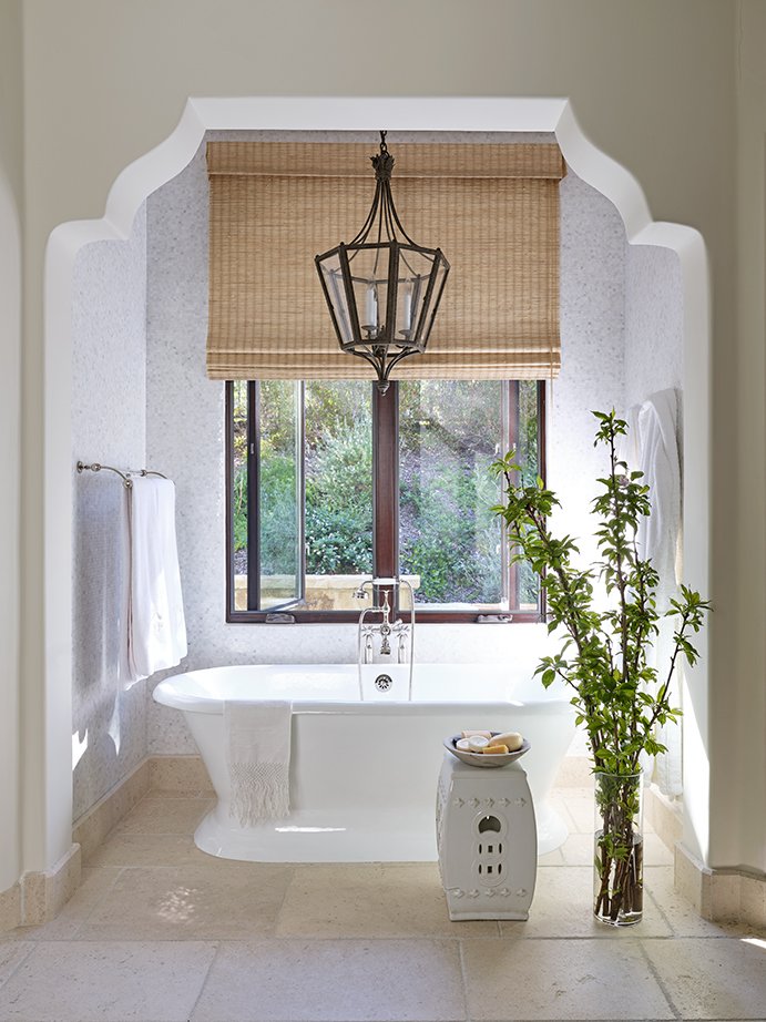 luxury modern organic primary bathroom freestanding tub woven wood shade light fixture cutout white Westlake village lake sherwood Thousand Oaks interior archaeology