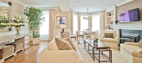 Serene, neutral living room staged by Interior Archaeology