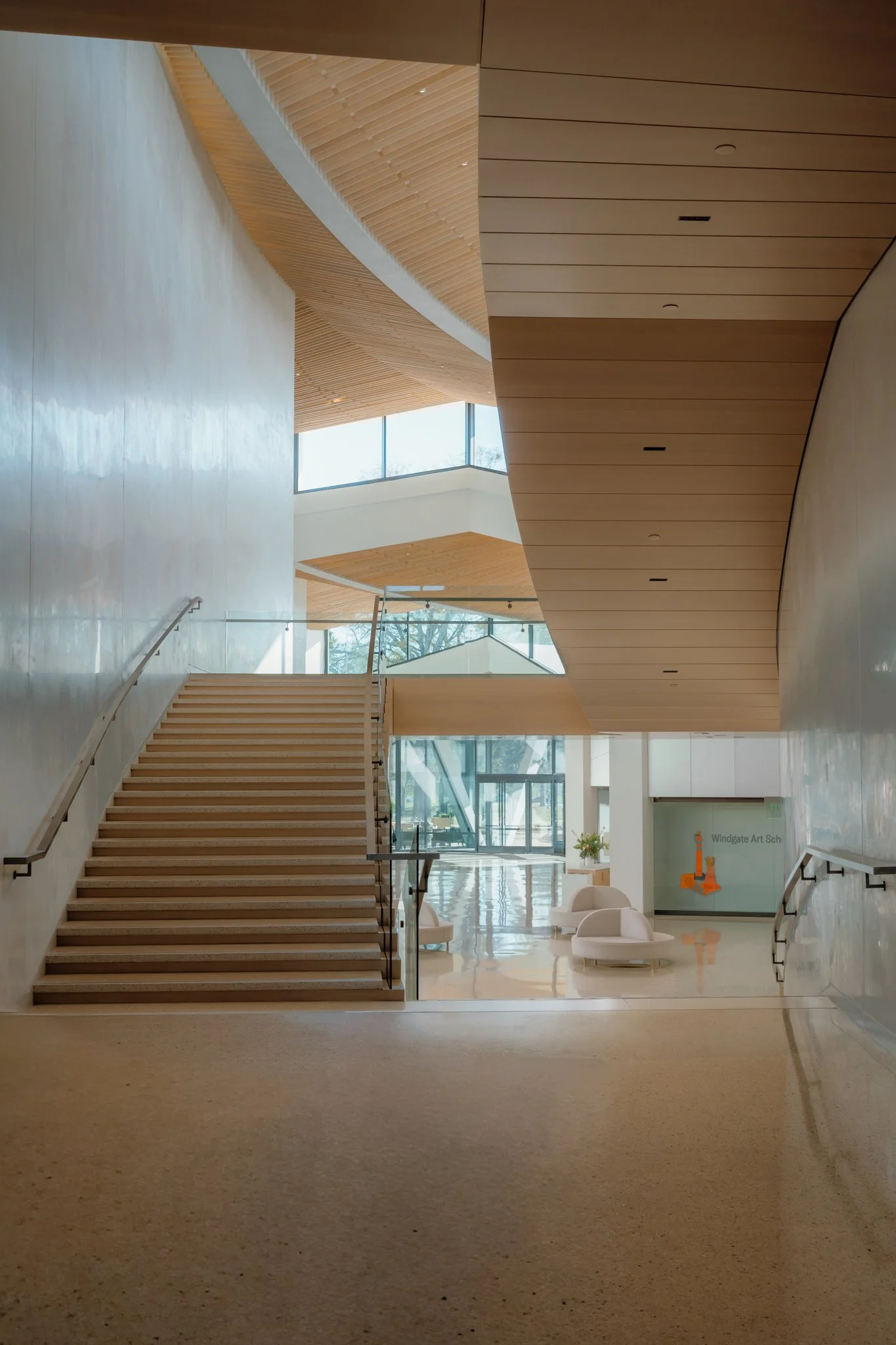 A beautiful stairway at ARKMFA designed by Polk Stanley Wilcox Architects in Little Rock, Arkansas. Captured by David Linn