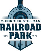 Logo for McCormick-Stillman Railroad Park featuring a blue train insignia and park name.
