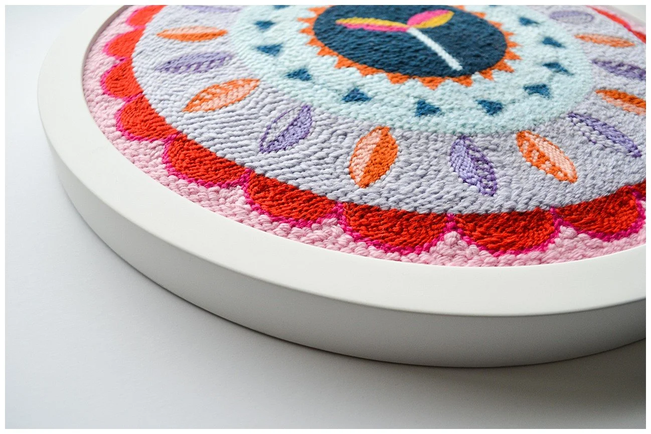 Close-up of punch needle design reflecting traditional Niuean motifs and sustainable textile practice.
