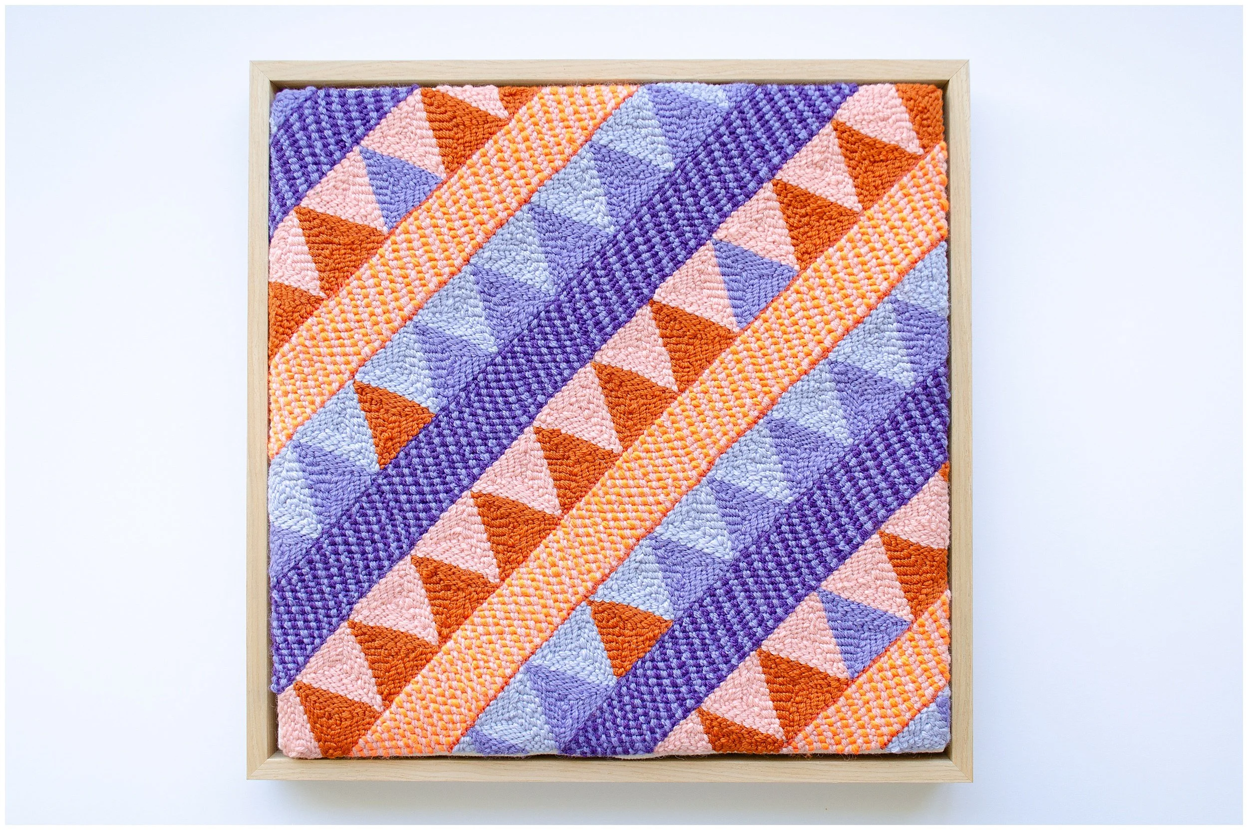 Contemporary wool artwork by Natalie Holland exploring Niuean storytelling through textile design.
