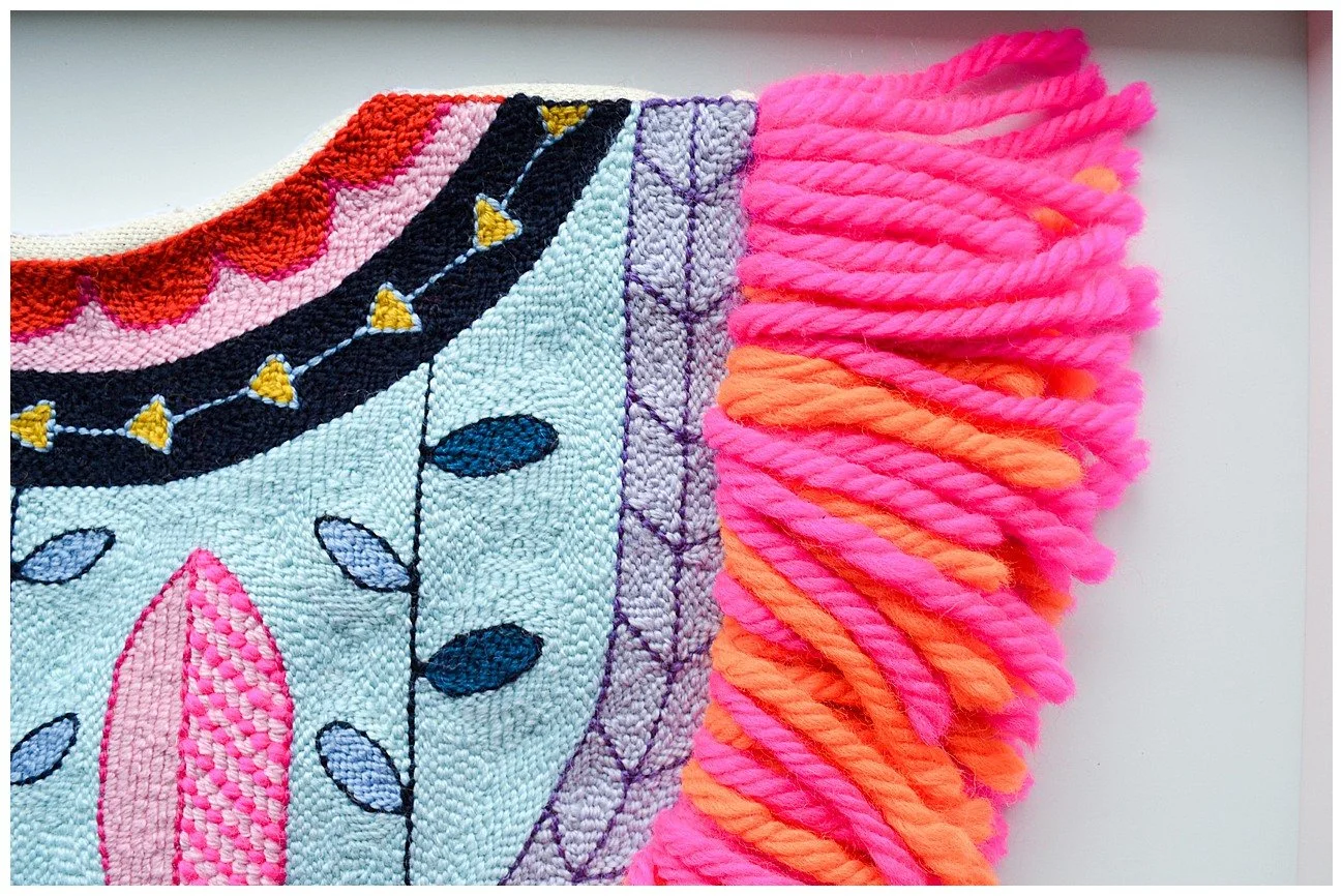 Modern interpretation of Niuean hiapo using tufted wool in a bright abstract design.