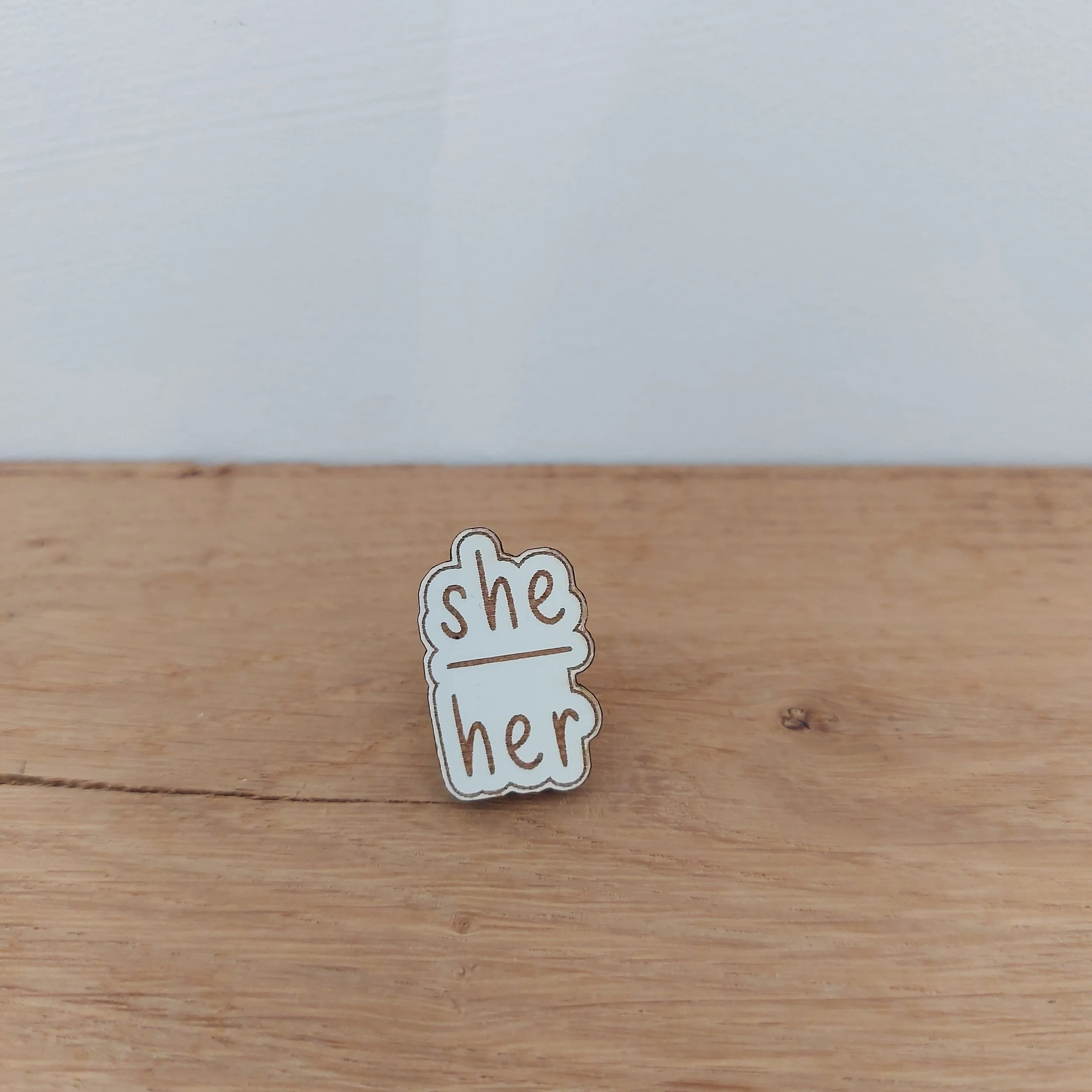 25.10.06 she-her badge small.jpg