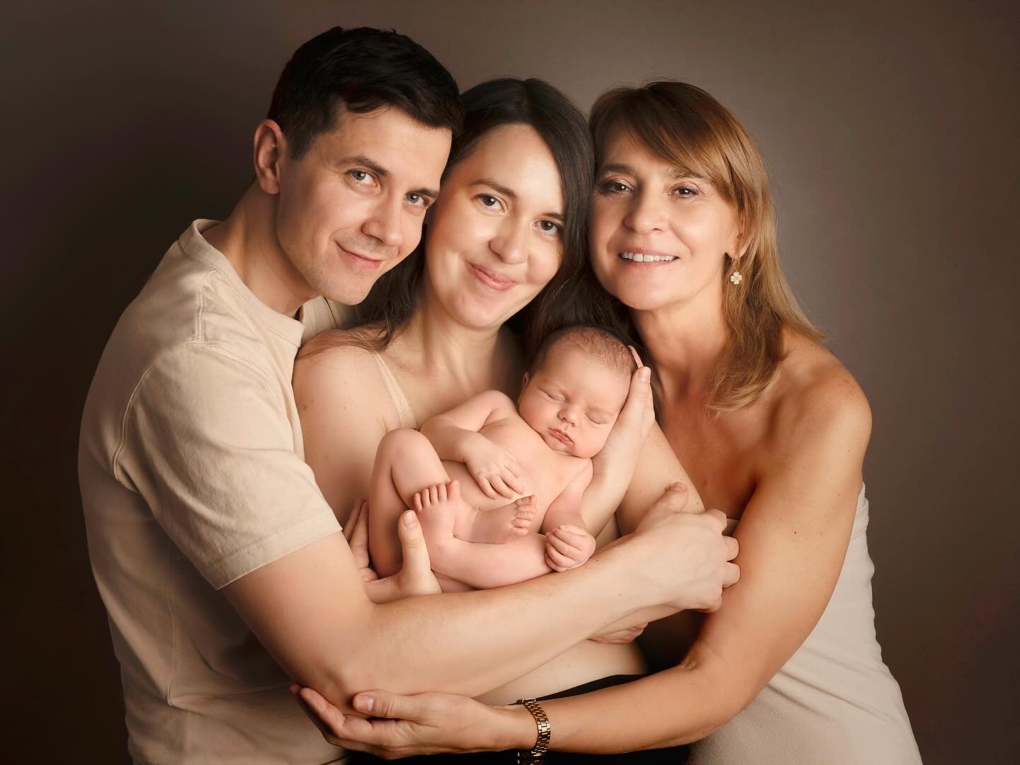 Every time I look at this portrait my heart melts a little.
Three generations, one tiny new life, held in so much love.

This is my job, but it&rsquo;s also my calling. I&rsquo;m invited into the most sacred season of family life and trusted to gentl