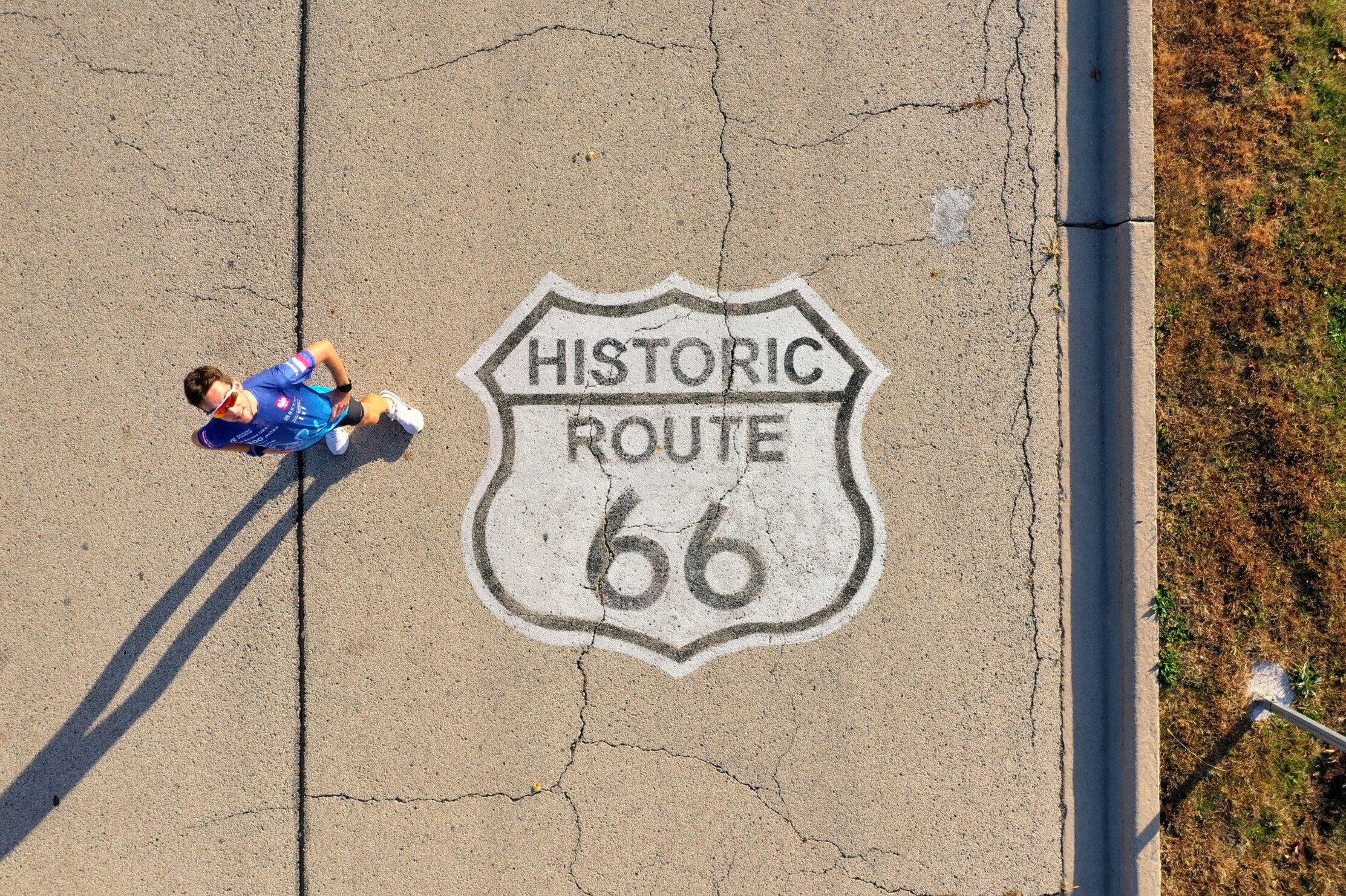 Drone over Tomasz on the mother road, historic route 66 painted on the pavement
