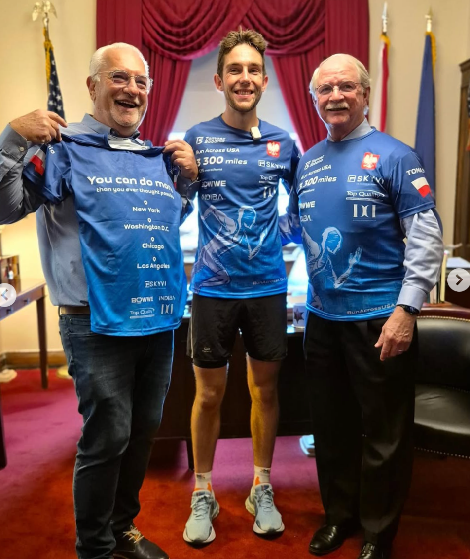 DC tomasz with a sponsor and other, in their office