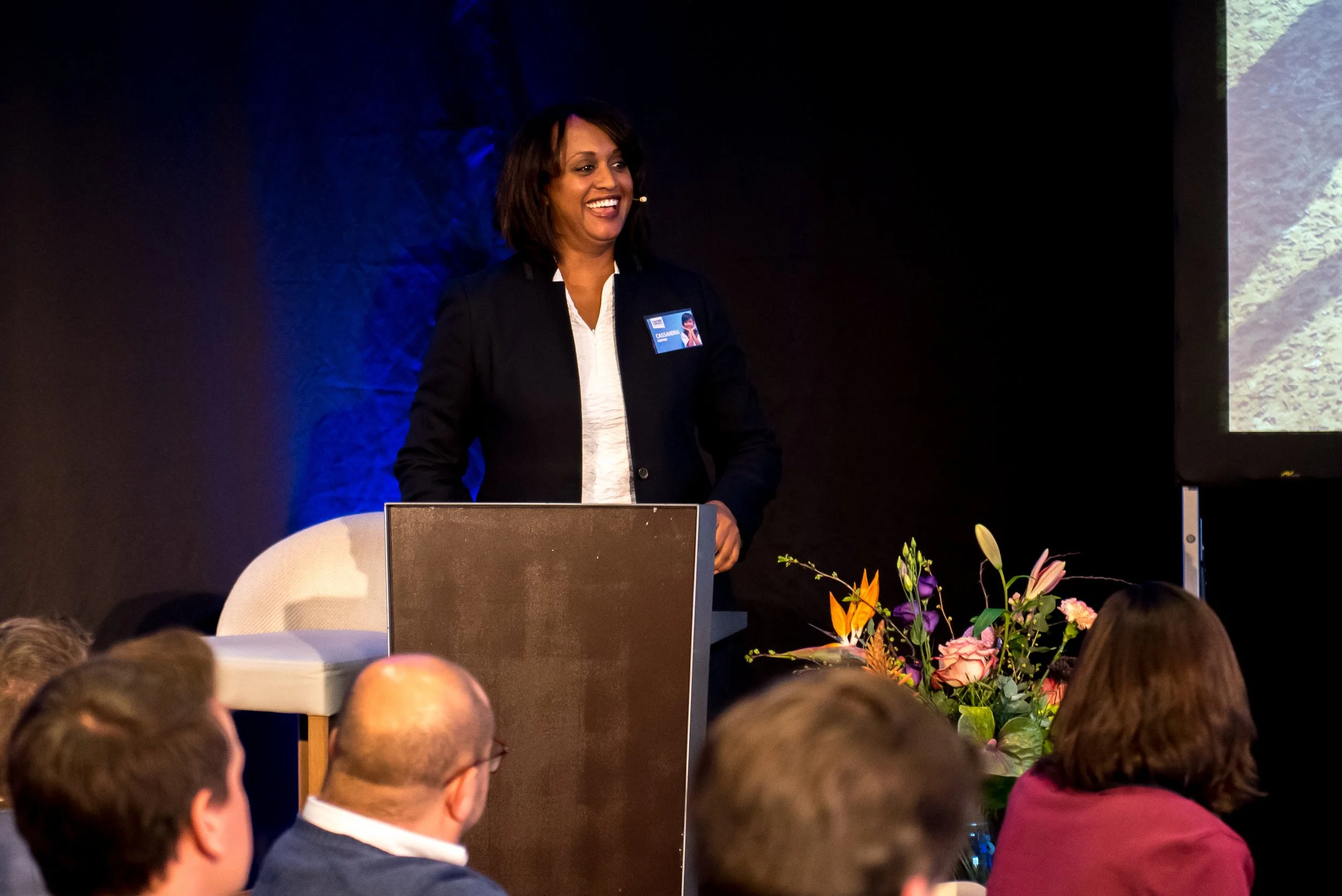 Cassandra Shepard speaking at a global leadership event in Europe