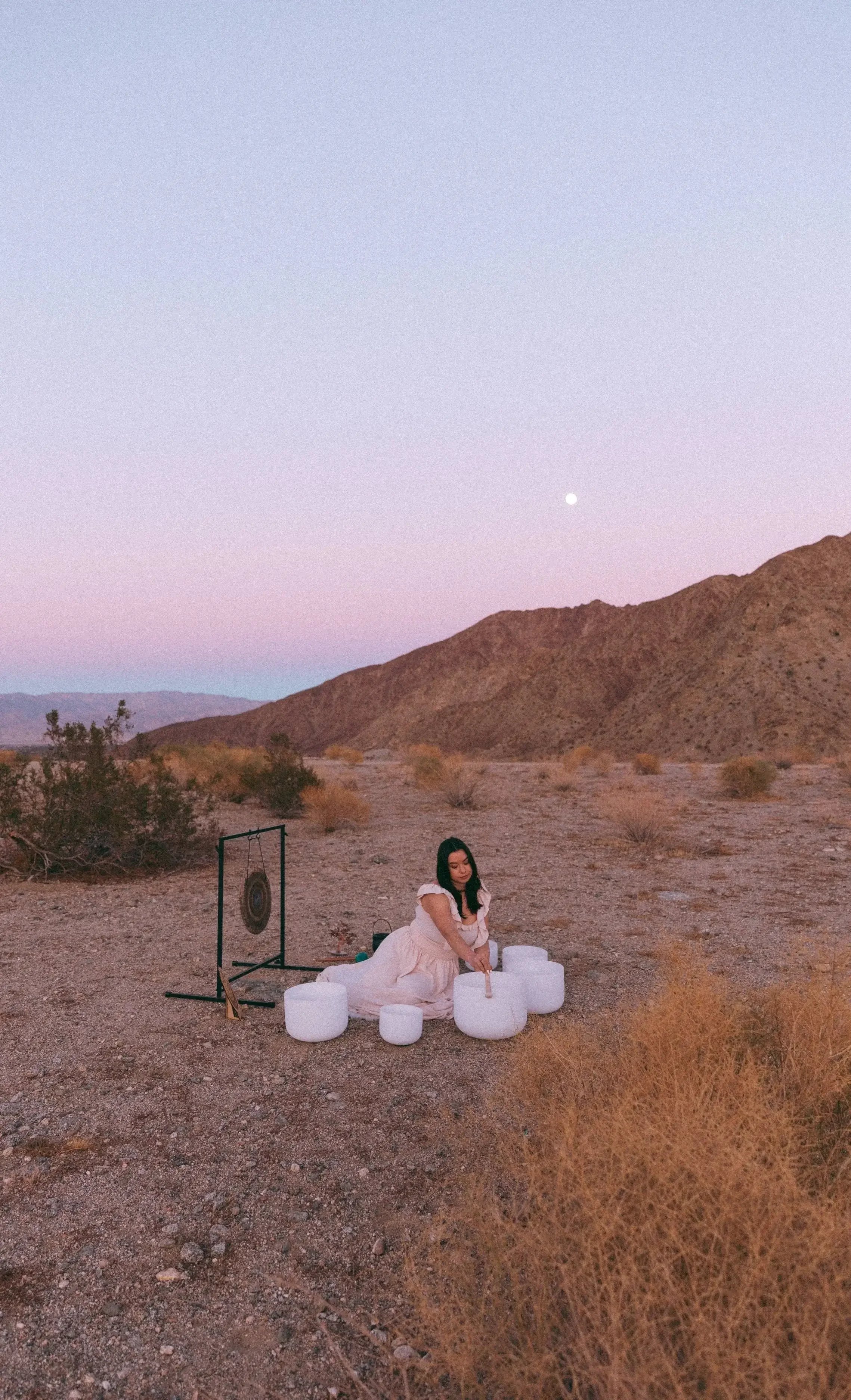 Holistic birth doula Kalista Zubiate in Whitter, CA with sound bath meditation bowls.