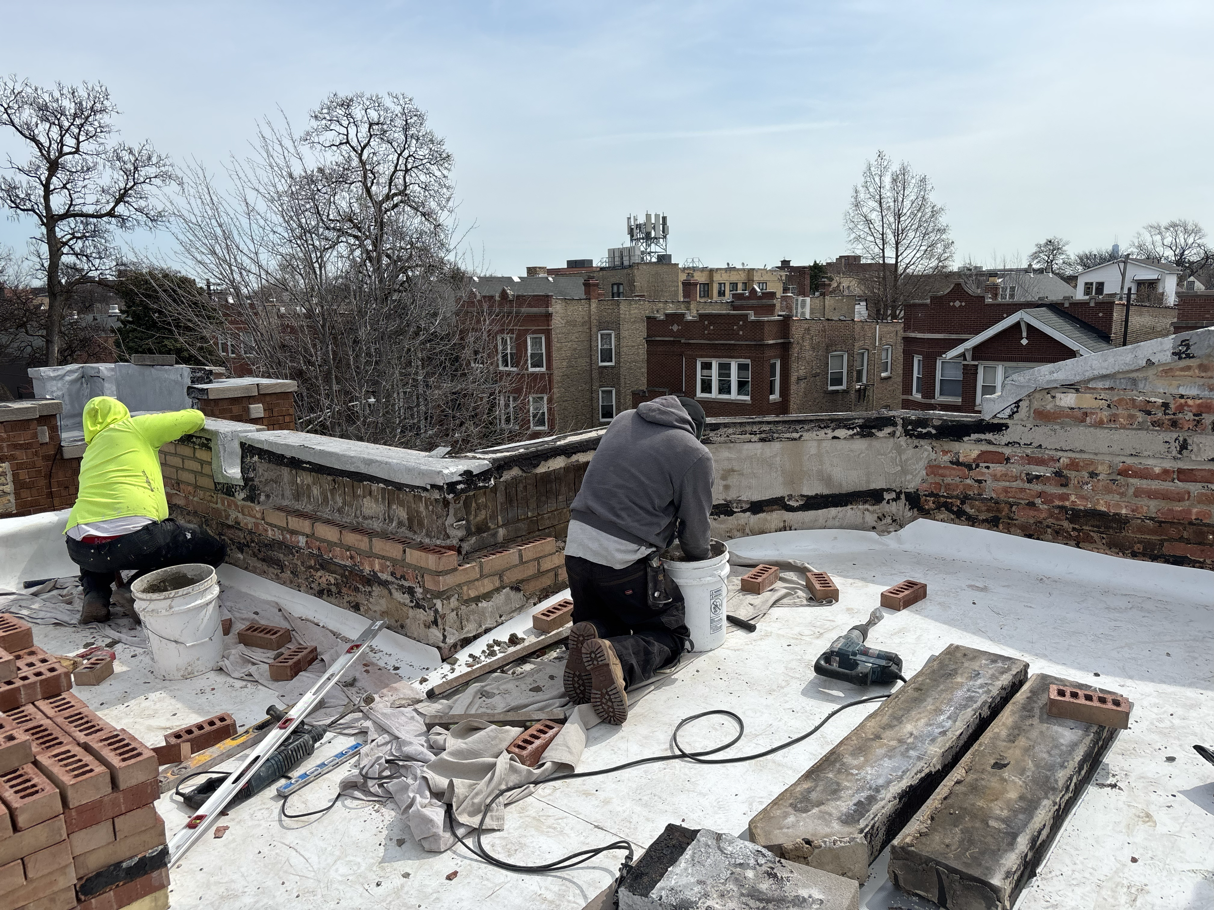 Front parapet wall rebuild