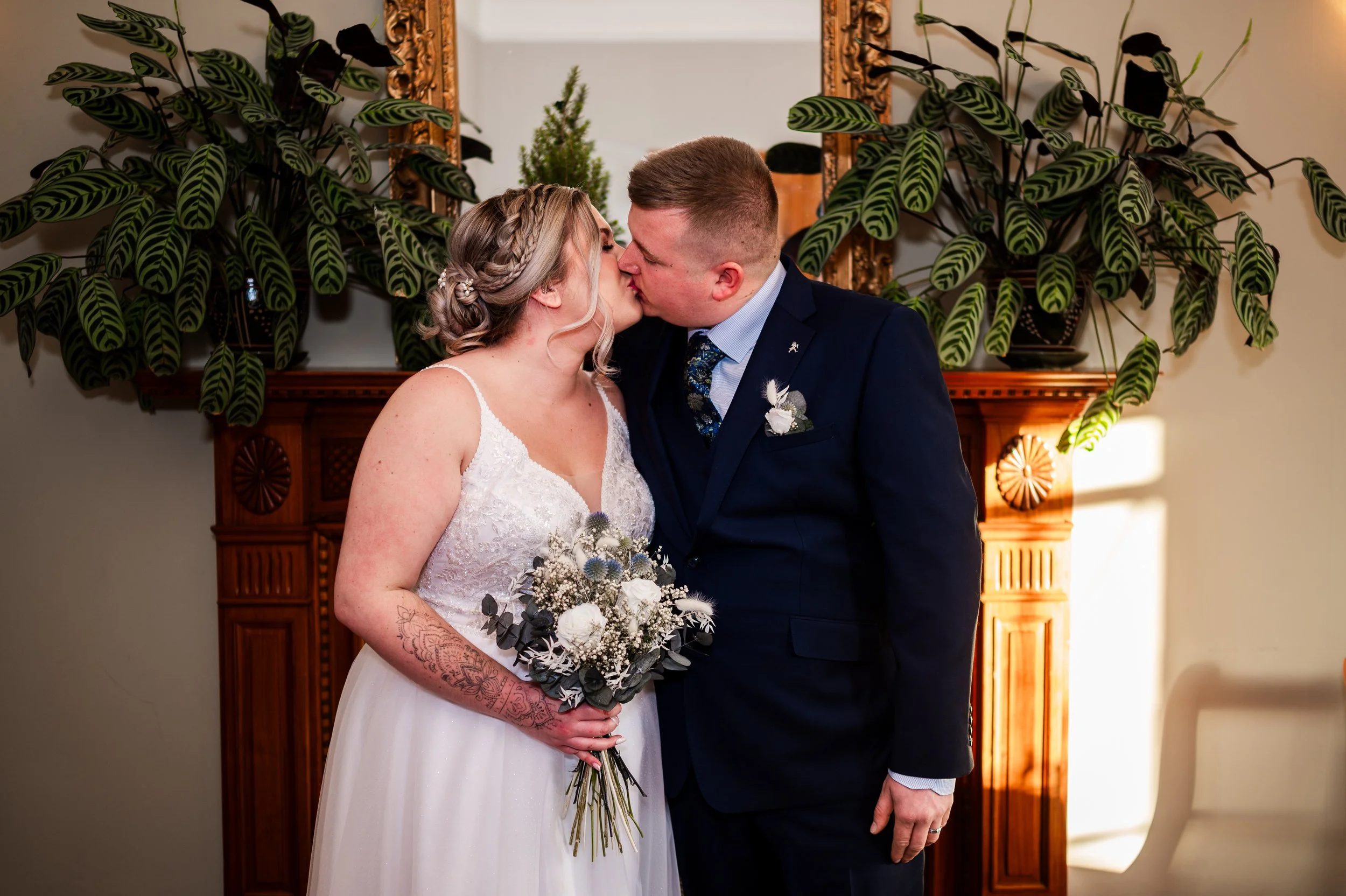 bride groom kissing wedding ceremony