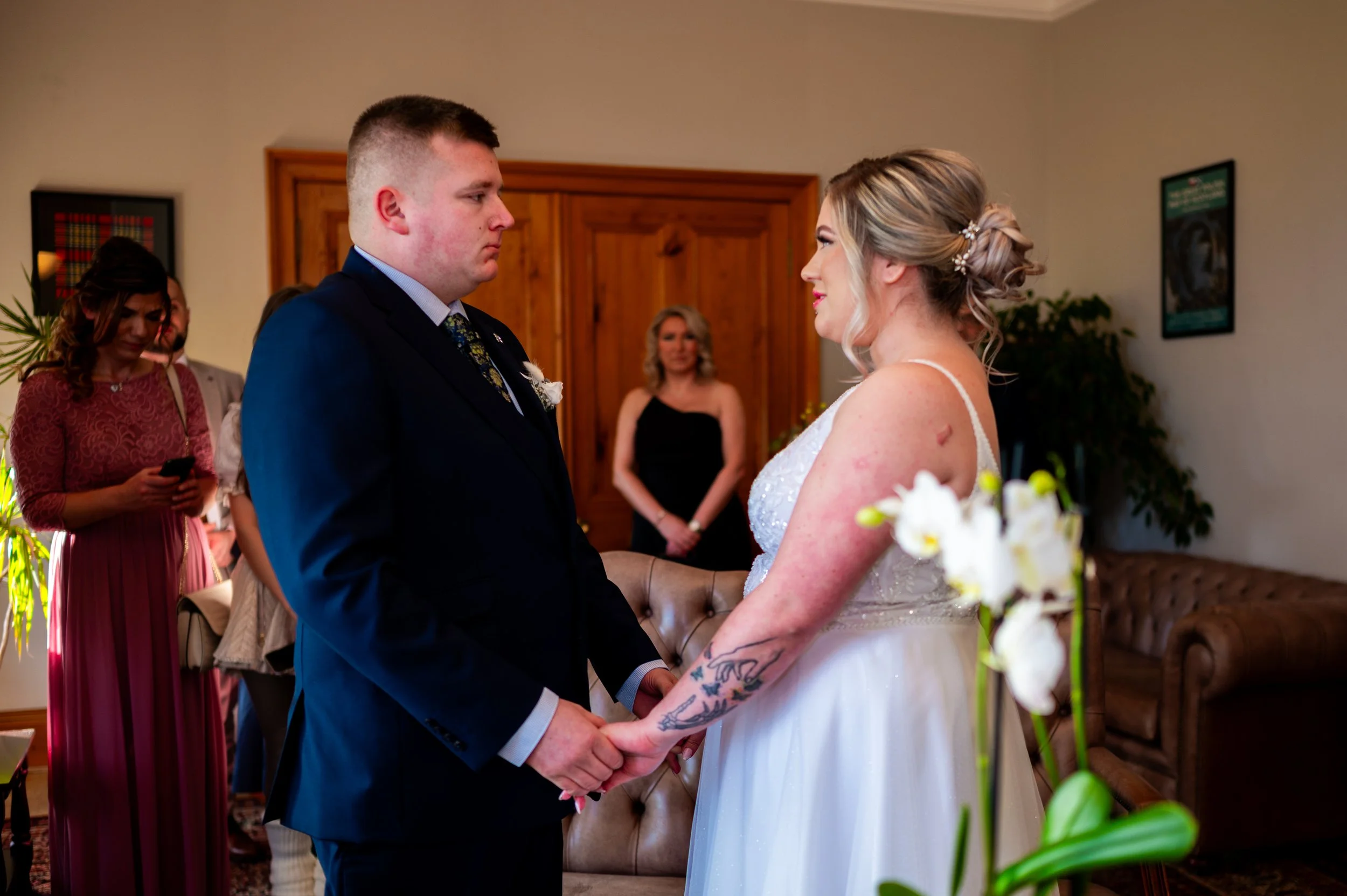 bride groom wedding ceremony holding hands with love