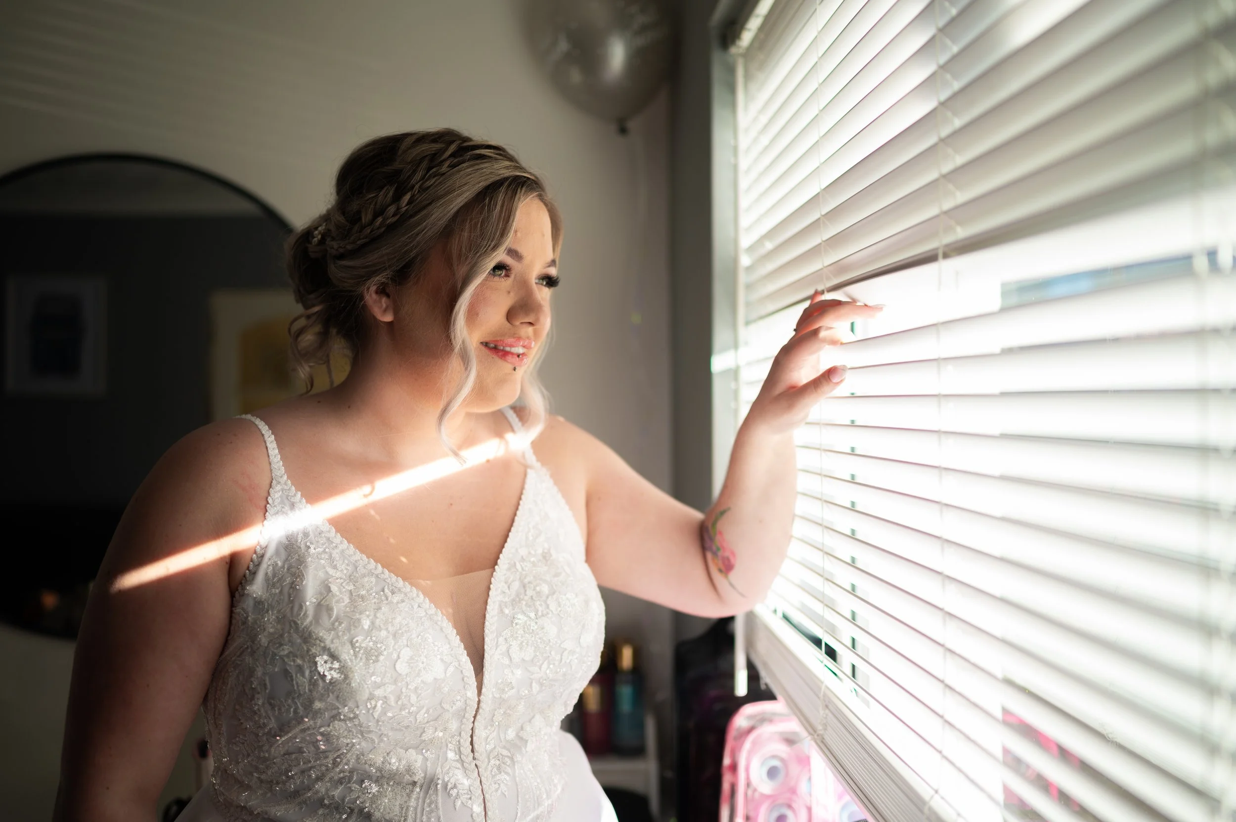 wedding bride preparations bride make up bride looking through the window