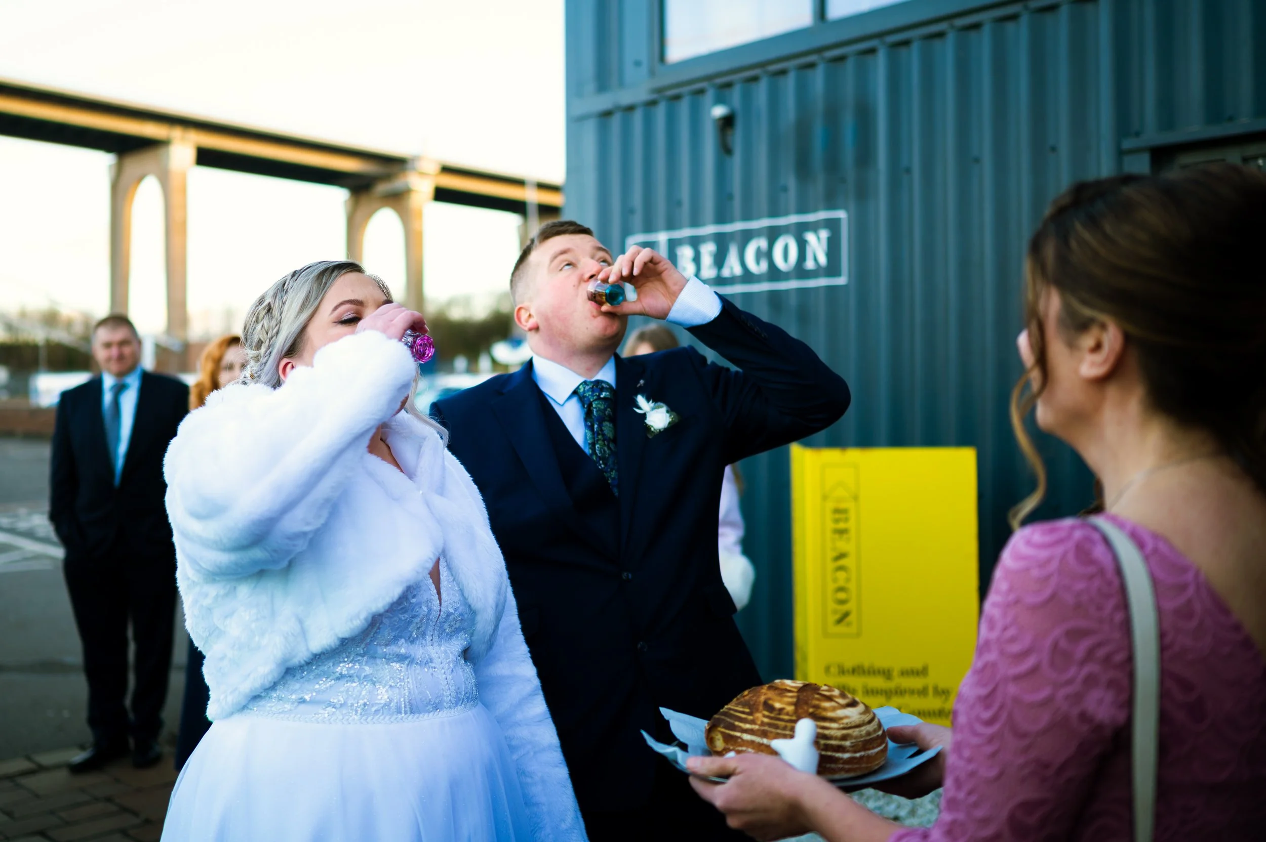 wedding reception restaurant dinner family members couple drinking vodka from glasses
