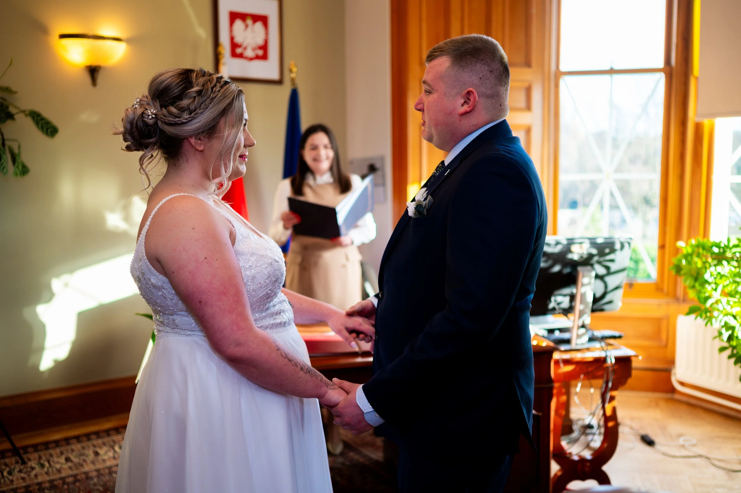 bride groom wedding ceremony holding hands