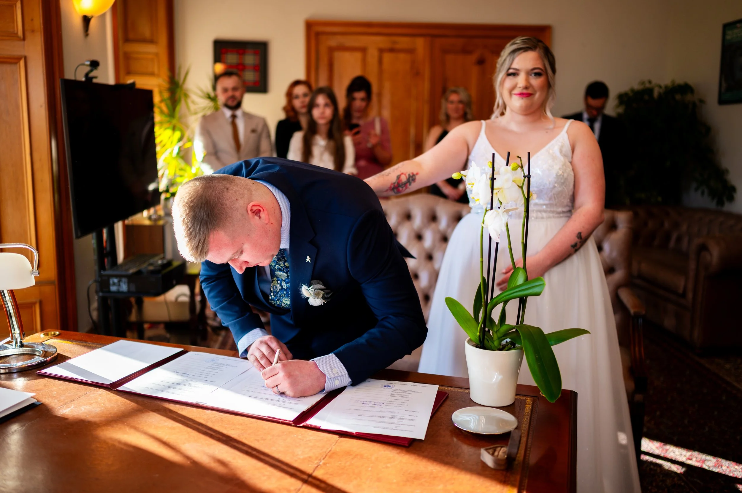bride groom wedding ceremony signing papers